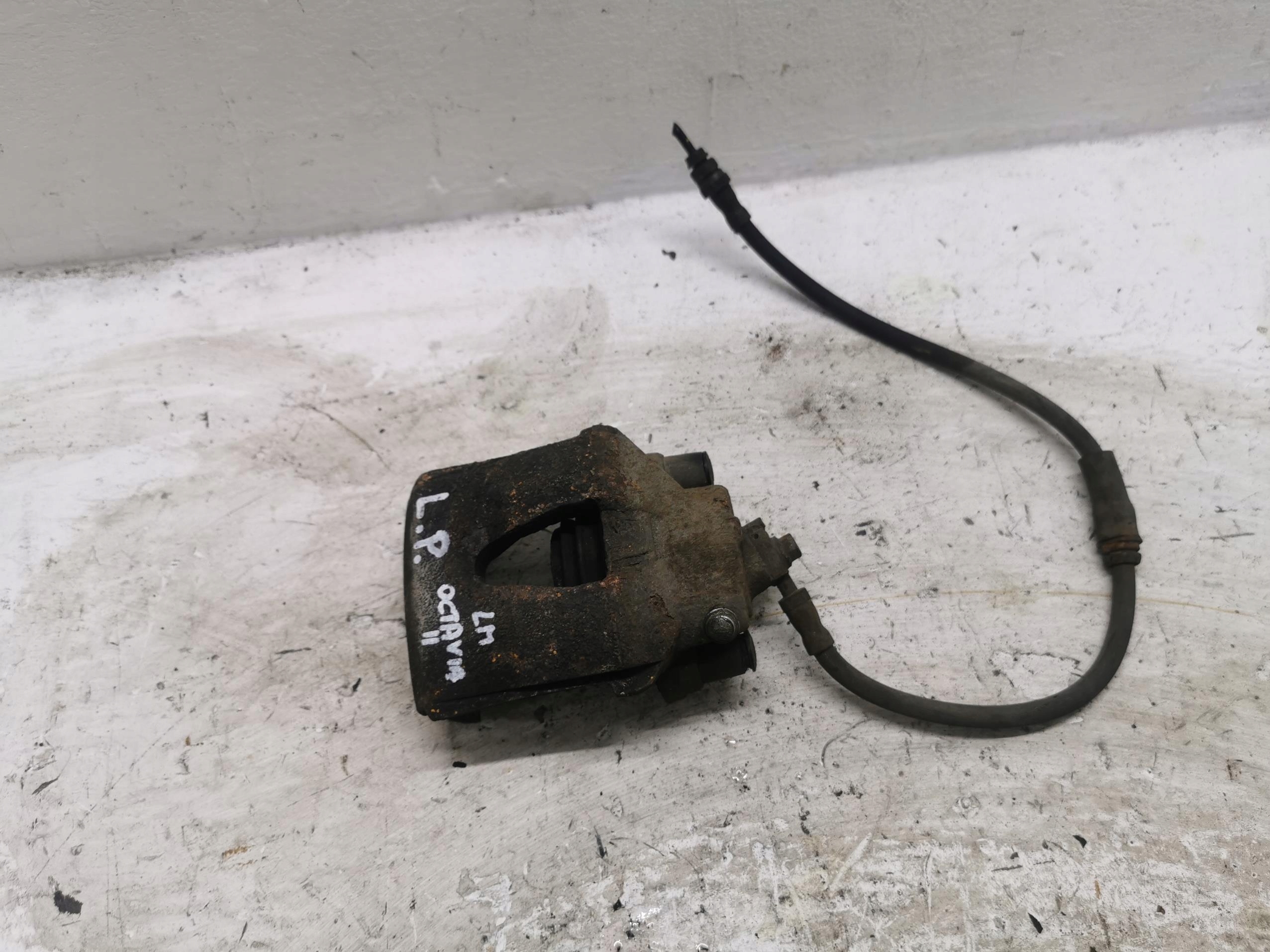 caliper brake left front SKODA OCTAVIA II LIFT