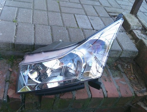 CHEVROLET CRUZE 08-12 LEWA PRZEDNIA LAMPA ORYGINAŁ