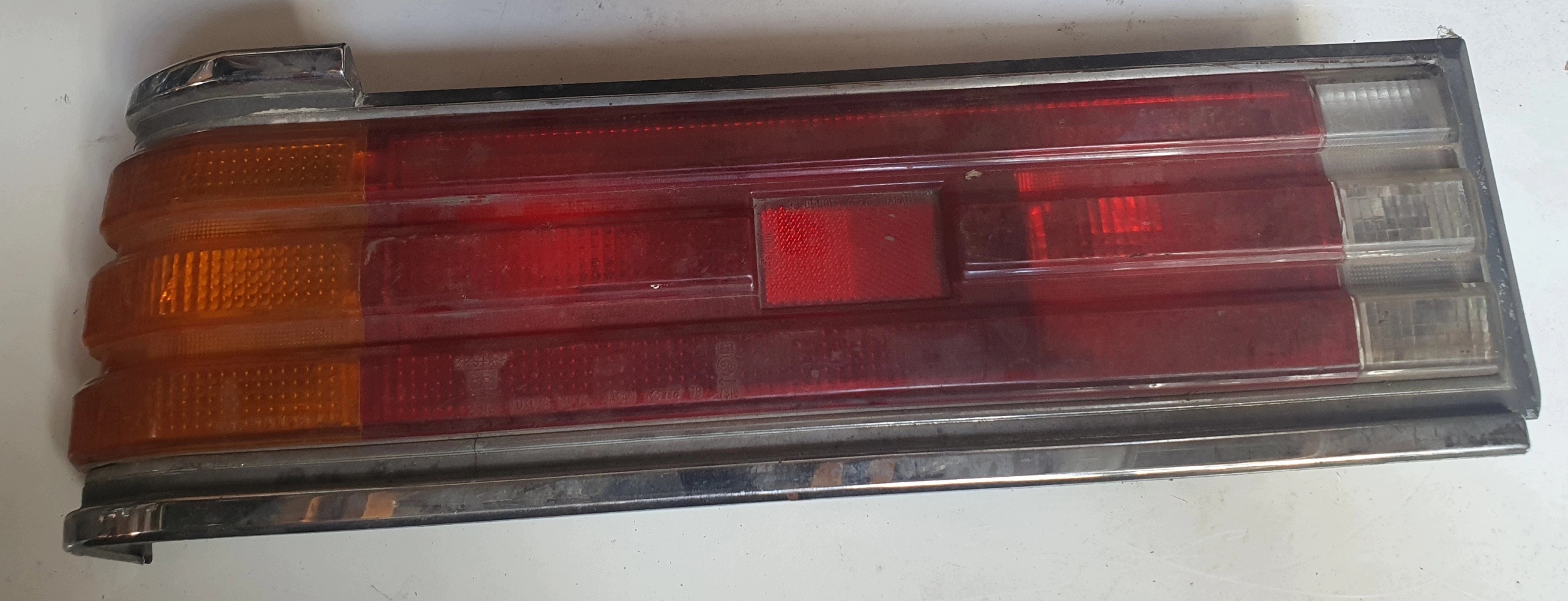 TOYOTA CROWN 80-83 light rear part left MS110 LS110 LS112 original