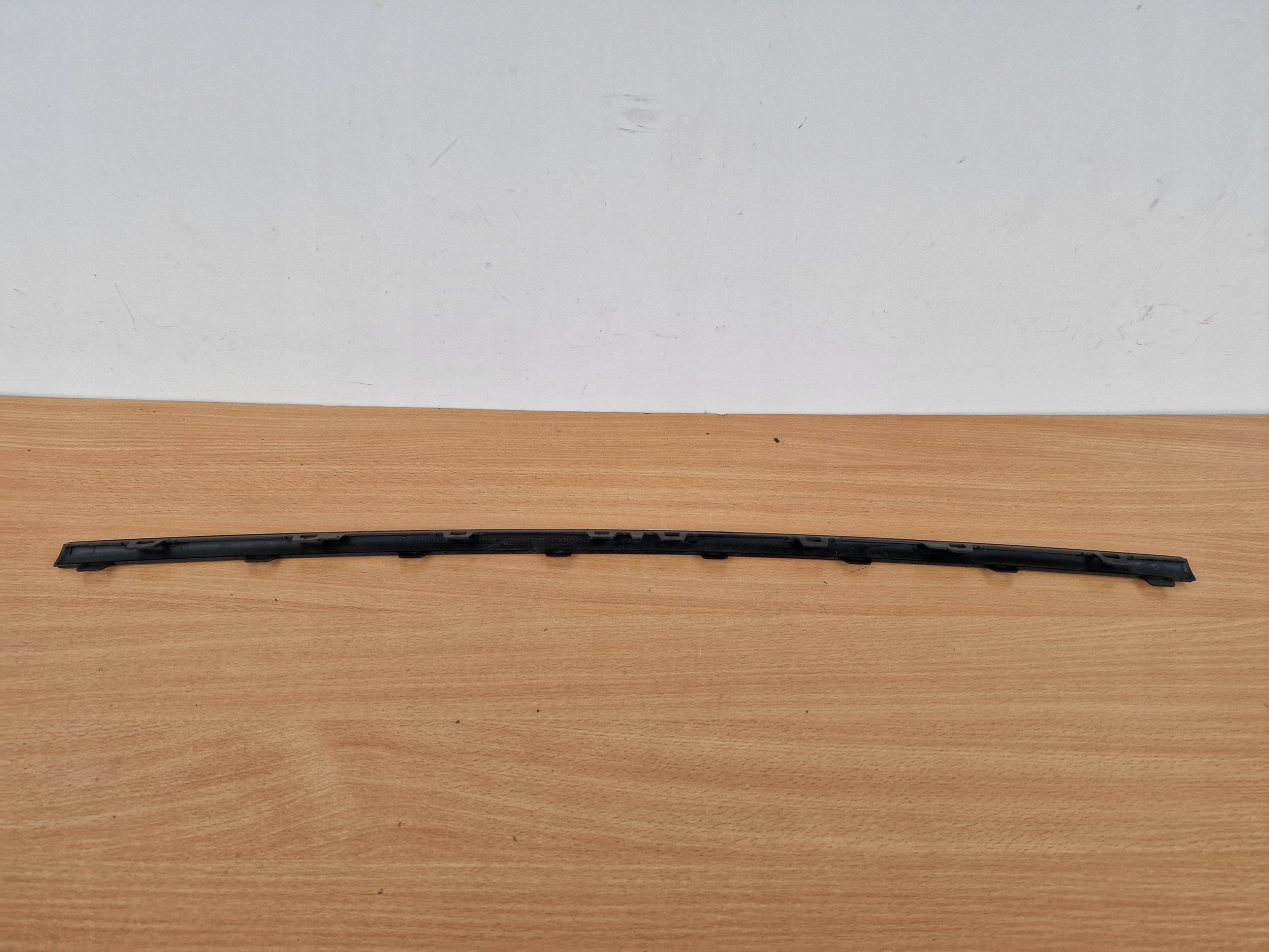 VW PASSAT B7 moulding of a bumper right front LISTEWKA