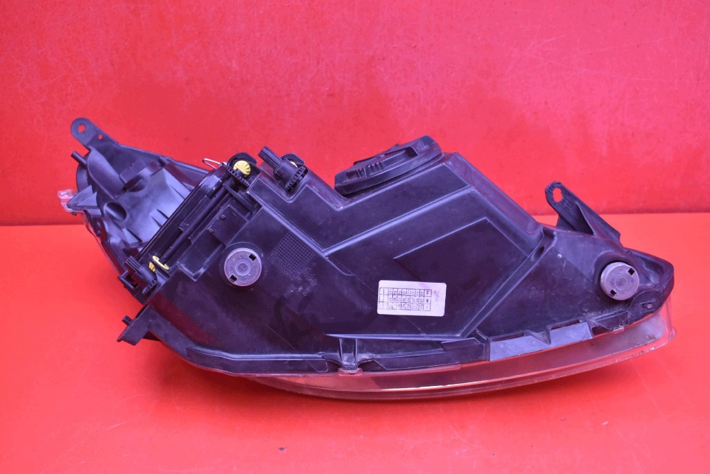 REFLEKTOR left light front EU 13186381 OPEL CORSA D 06-11