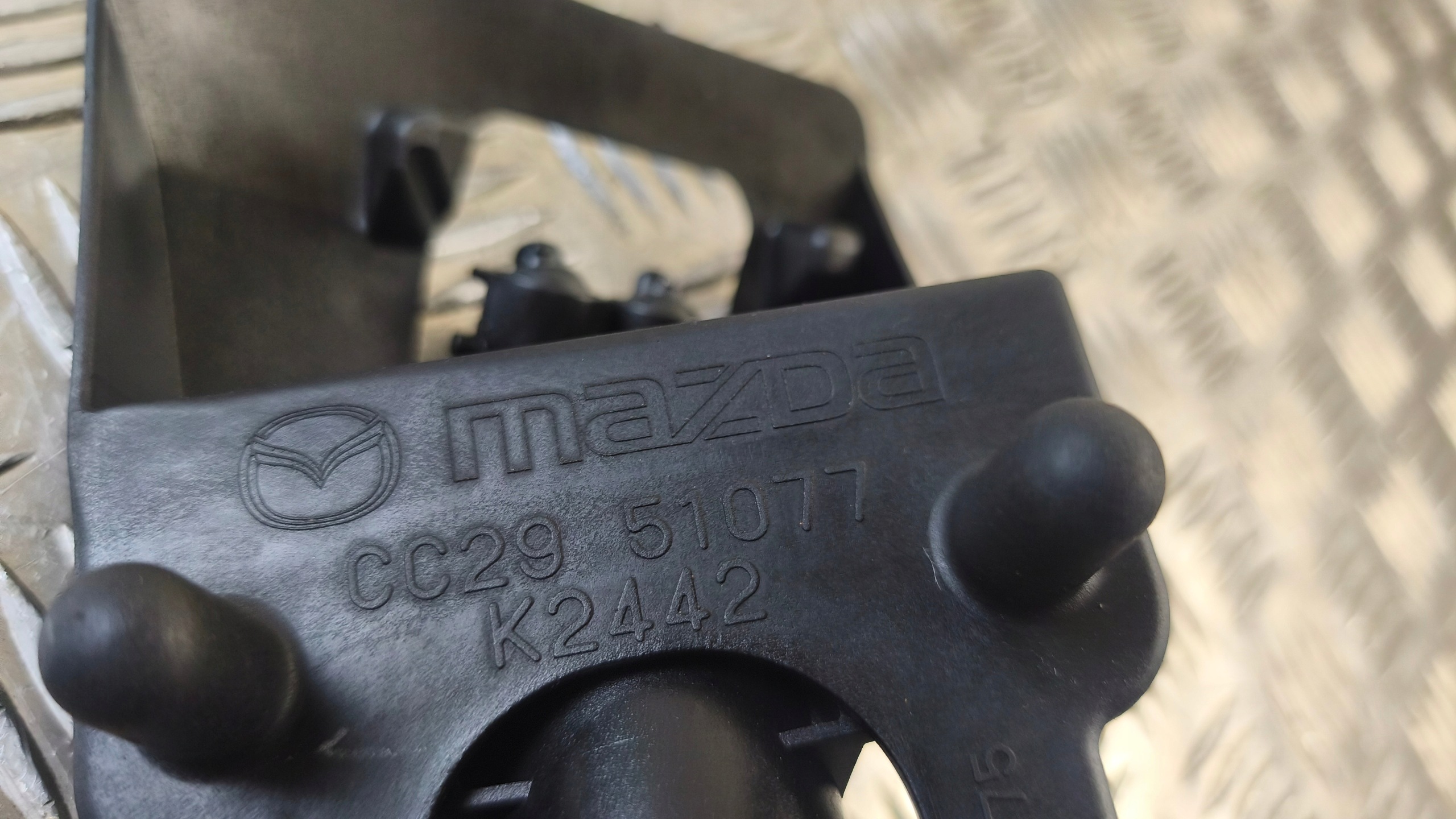 washer of lights left front MAZDA 5 2006r CC2951077