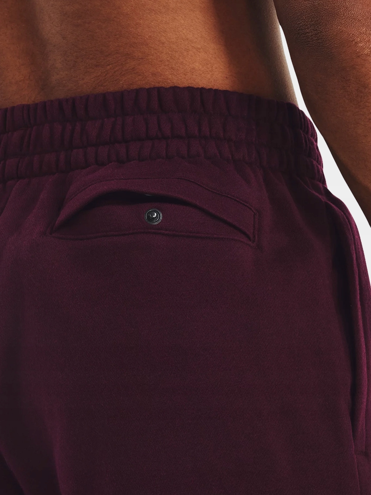 SPODNIE DRESOWE MĘSKIE UNDER ARMOUR DRESY JOGGERY BAWEŁNA SPORTOWE 1379774 Odcień bordowy