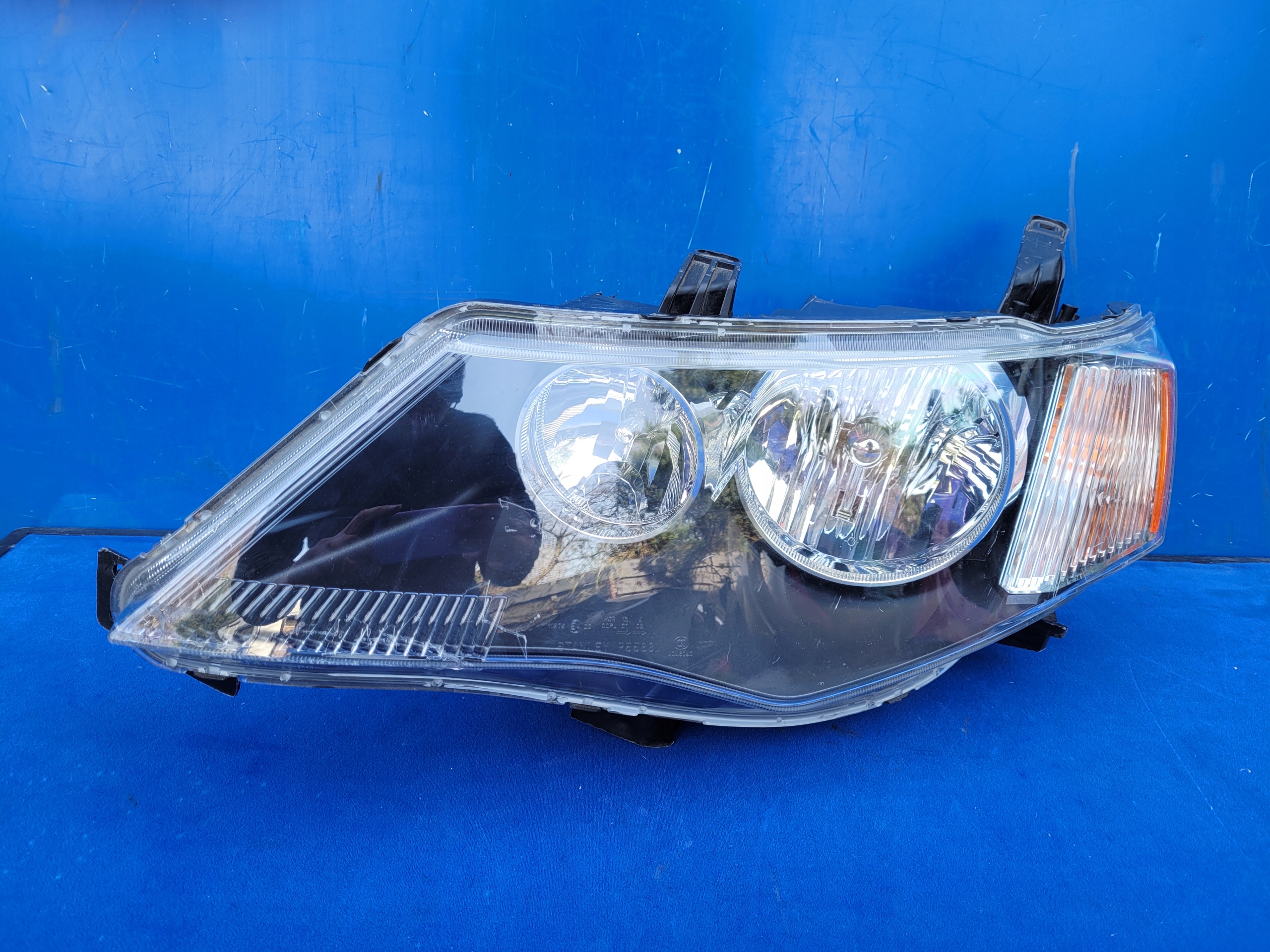 MITSUBISHI OUTLANDER 07-09 REFLEKTOR LAMPA LEWA