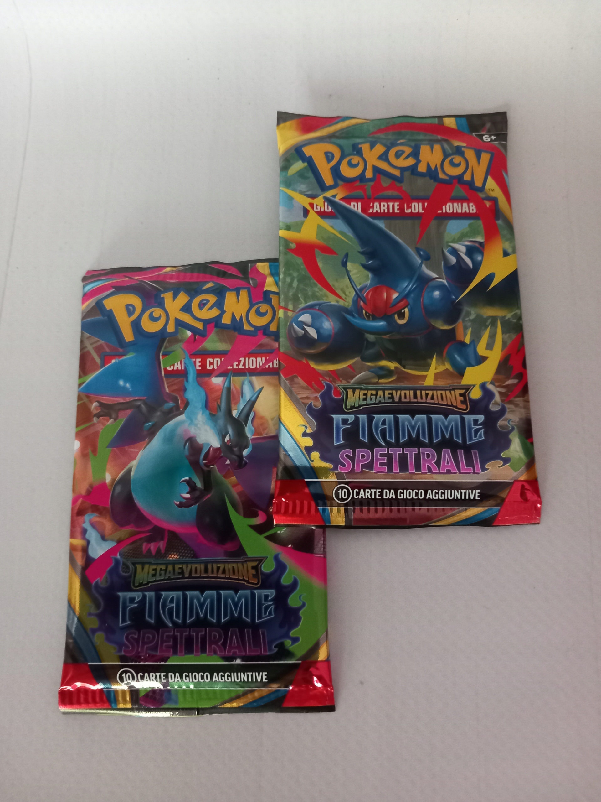 Karty Pokémon Evolution Fiaamme Spettrali Booster 2 sztuki j. Włoski