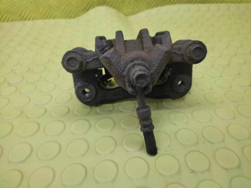 KIA RIO II 1.4 caliper left rear part