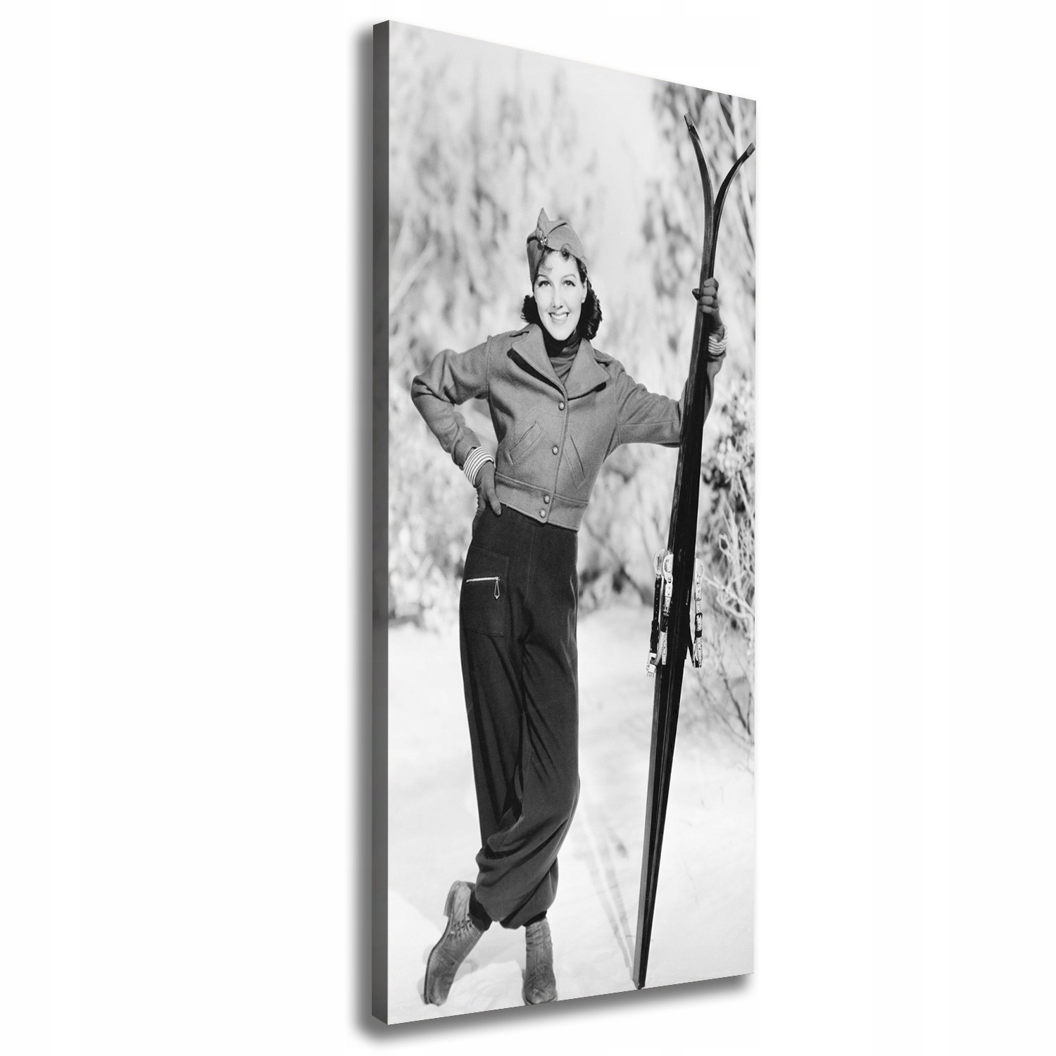 

Foto obraz na płótnie Kobieta z nartami 50x125 cm
