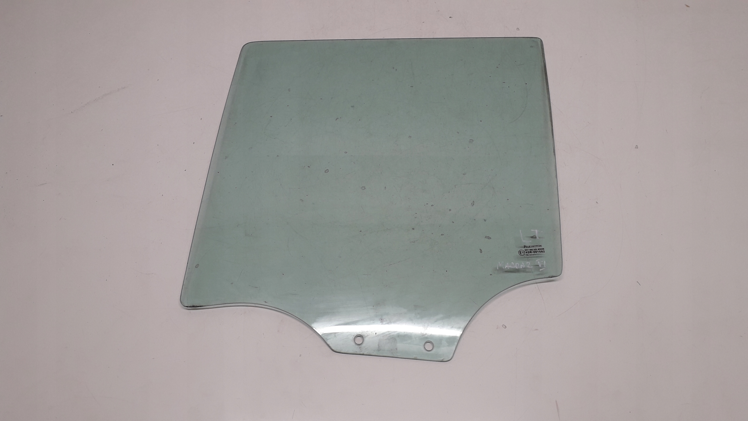 MAZDA 2 II 02-07 SZYBA Z DRZWI LEWY TYŁ