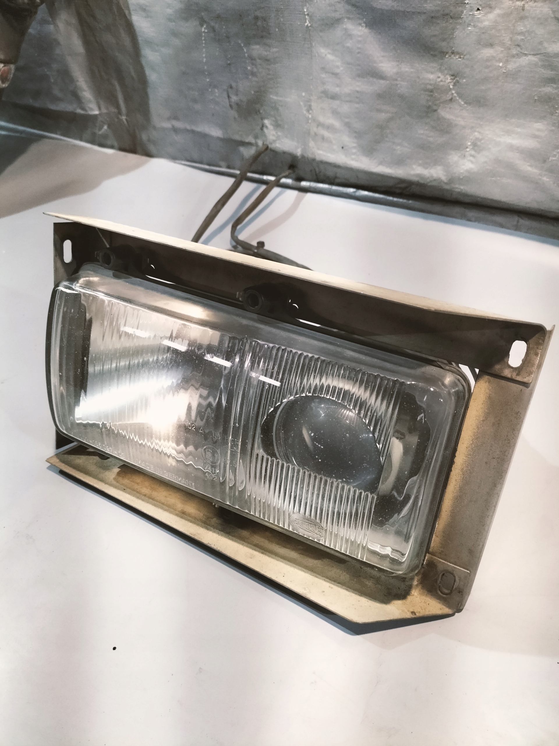 REFLEKTOR light front SCANIA 4 left HELLA
