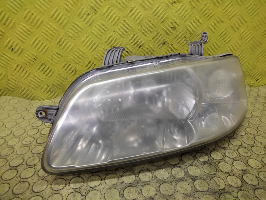 CHEVROLET AVEO T200 REFLEKTOR light left front 0301002029