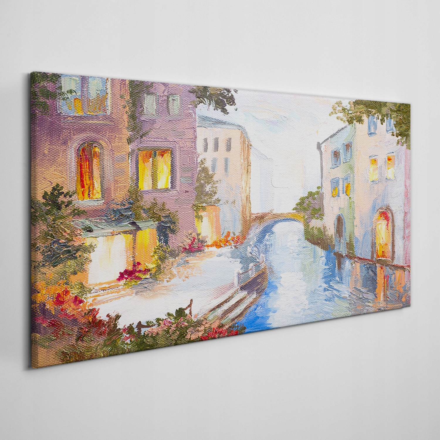

Obraz na płótnie Miasto rzeka most kwiaty 120x60