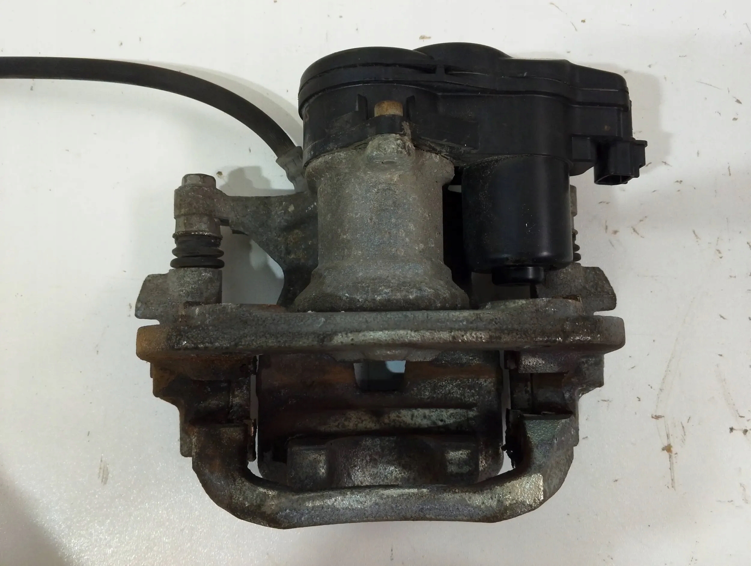 Toyota Corolla E210 E21 caliper rear left (B107)