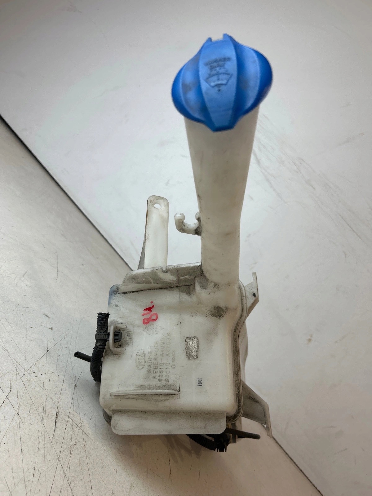 washer fluid tank pump Kia Carens IV