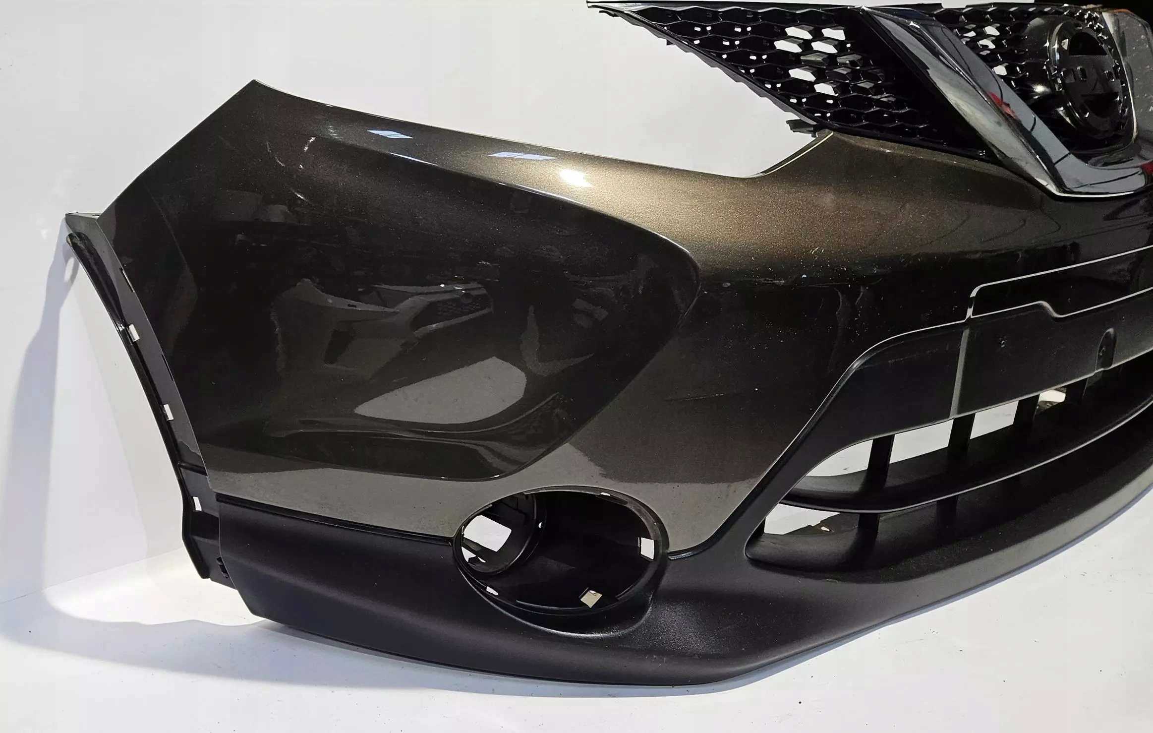 front bumper + grille NISSAN QASHQAI J11 13-17