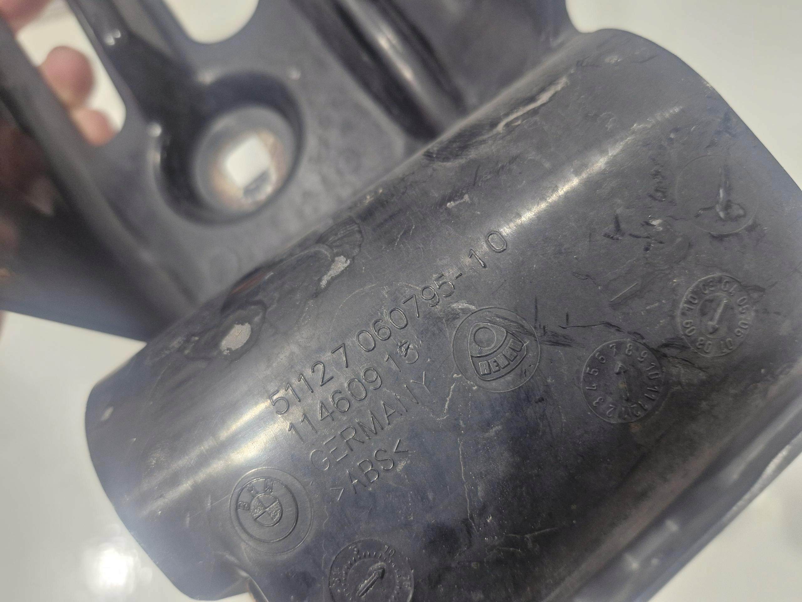 7060795 BMW E61 support holder of a bumper left rear part