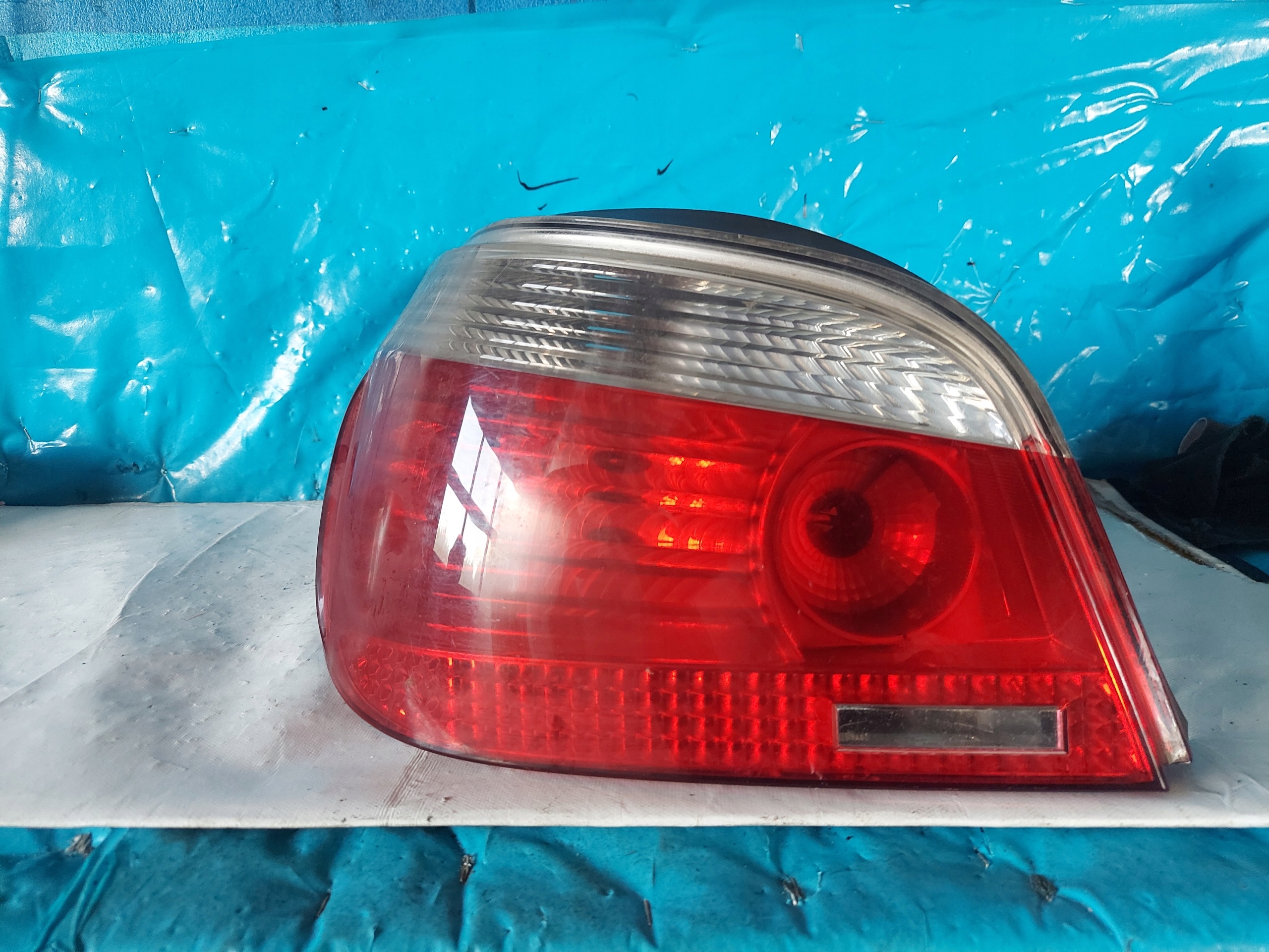 light BMW E60 sedan 6910767 left rear part
