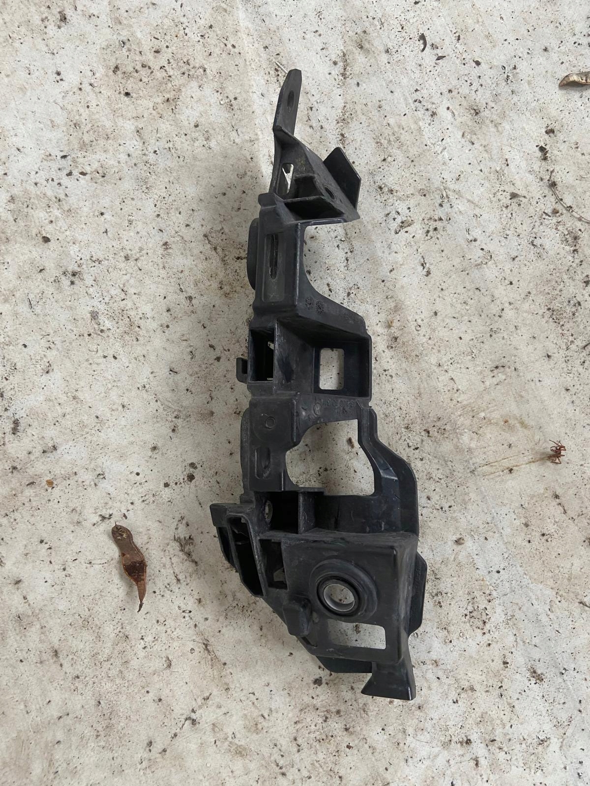 VW GOLF VII 5G 12- support holder console bumper right front