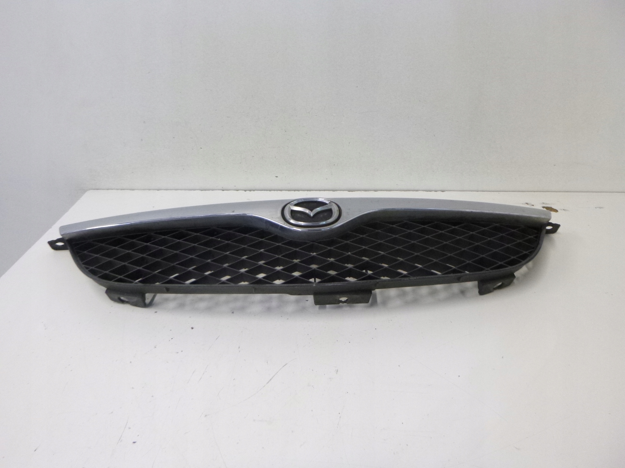 maska maska Mazda 626 GF 2000r.
