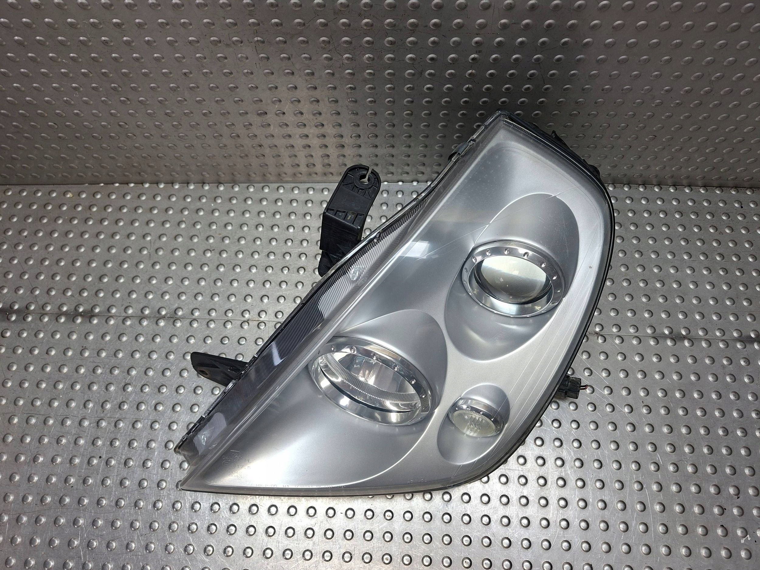 light left REFLEKTOR SSANGYONG REXTON and 01-06 EUROPA 108-0399