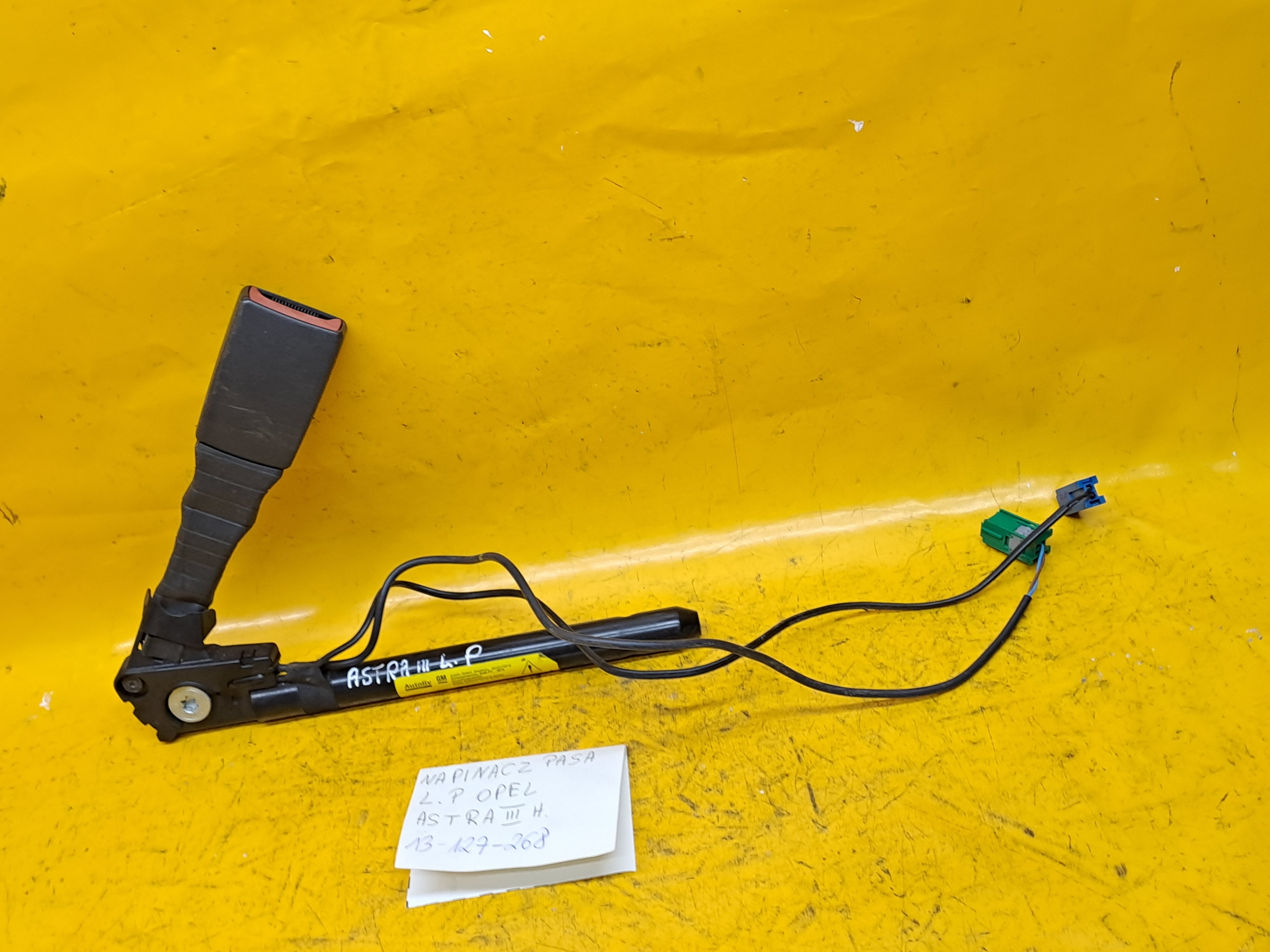 НАТЯЖИТЕЛЬ РЕМНЯ ЛЕВЫЙ ПЕРЕДНИЙ ASTRA III H 13127268