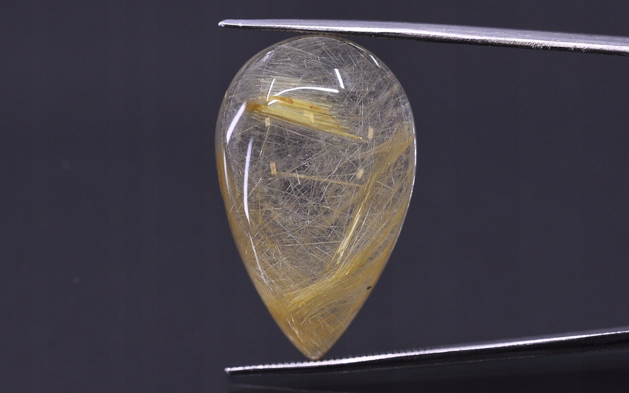 Křemen s rutilem kabošon slza 25x15 mm