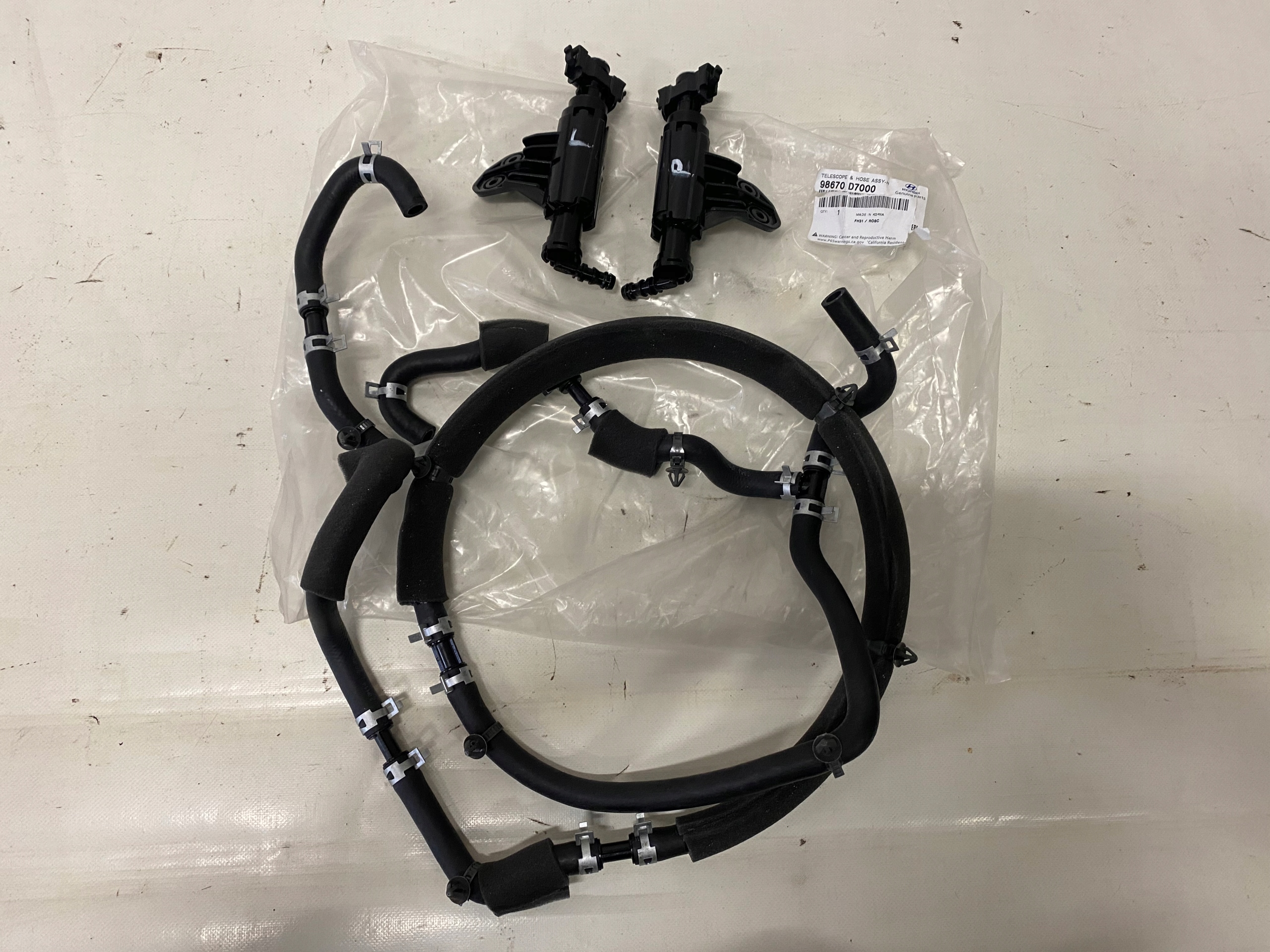 D7986-02590 - ШАЙБА ЛАМПЫ ЛЕВАЯ TUCSON II OE