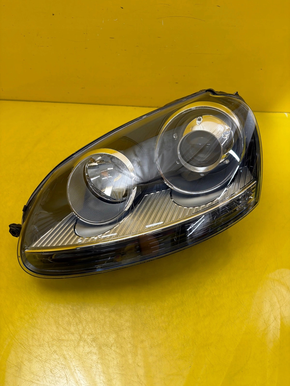 light left front VW Golf V Xenon 1K6941039
