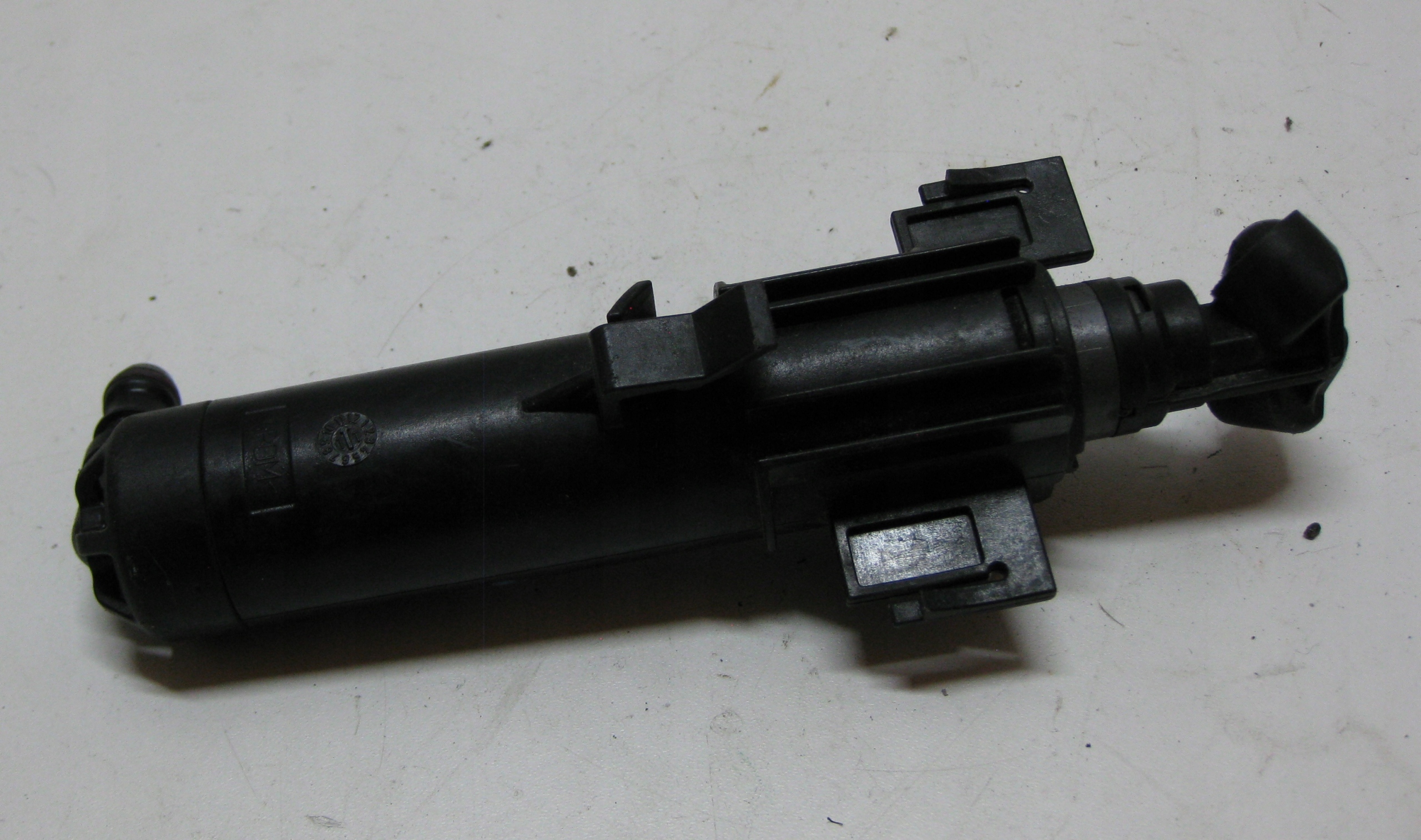 AUDI A4 B8 washer DYSZA REFLEKTORA left 8K0955101A