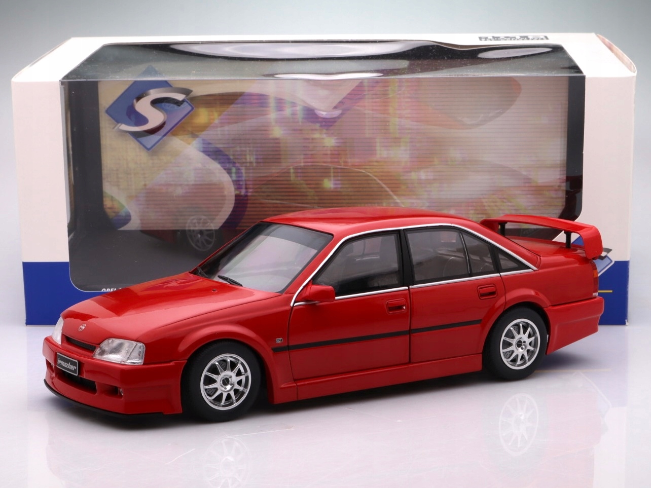 Opel Omega 300 24V 1990, červená Solido 1:18