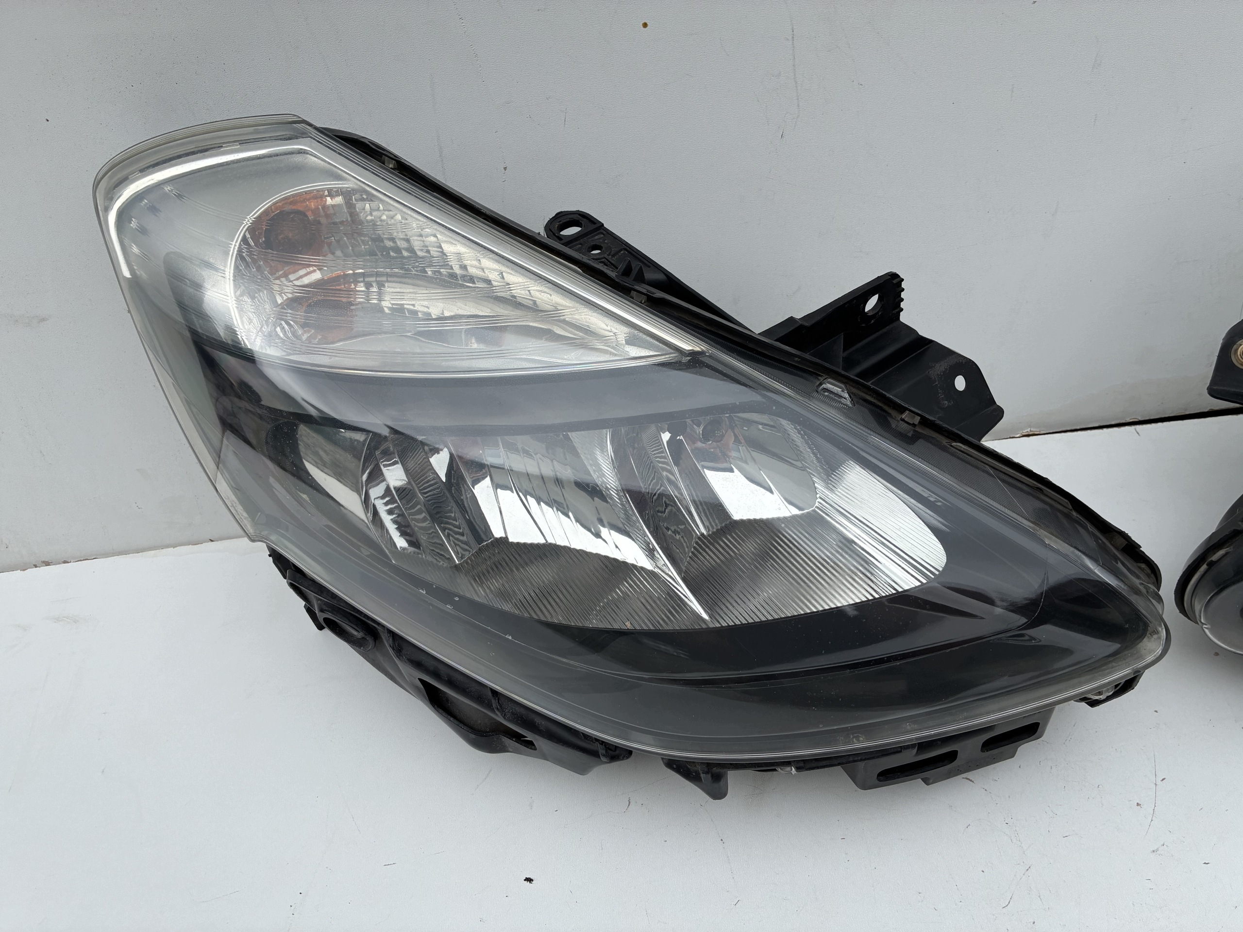 Reflektor light front front right left Renault Clio III Lift 09-12r. Eu