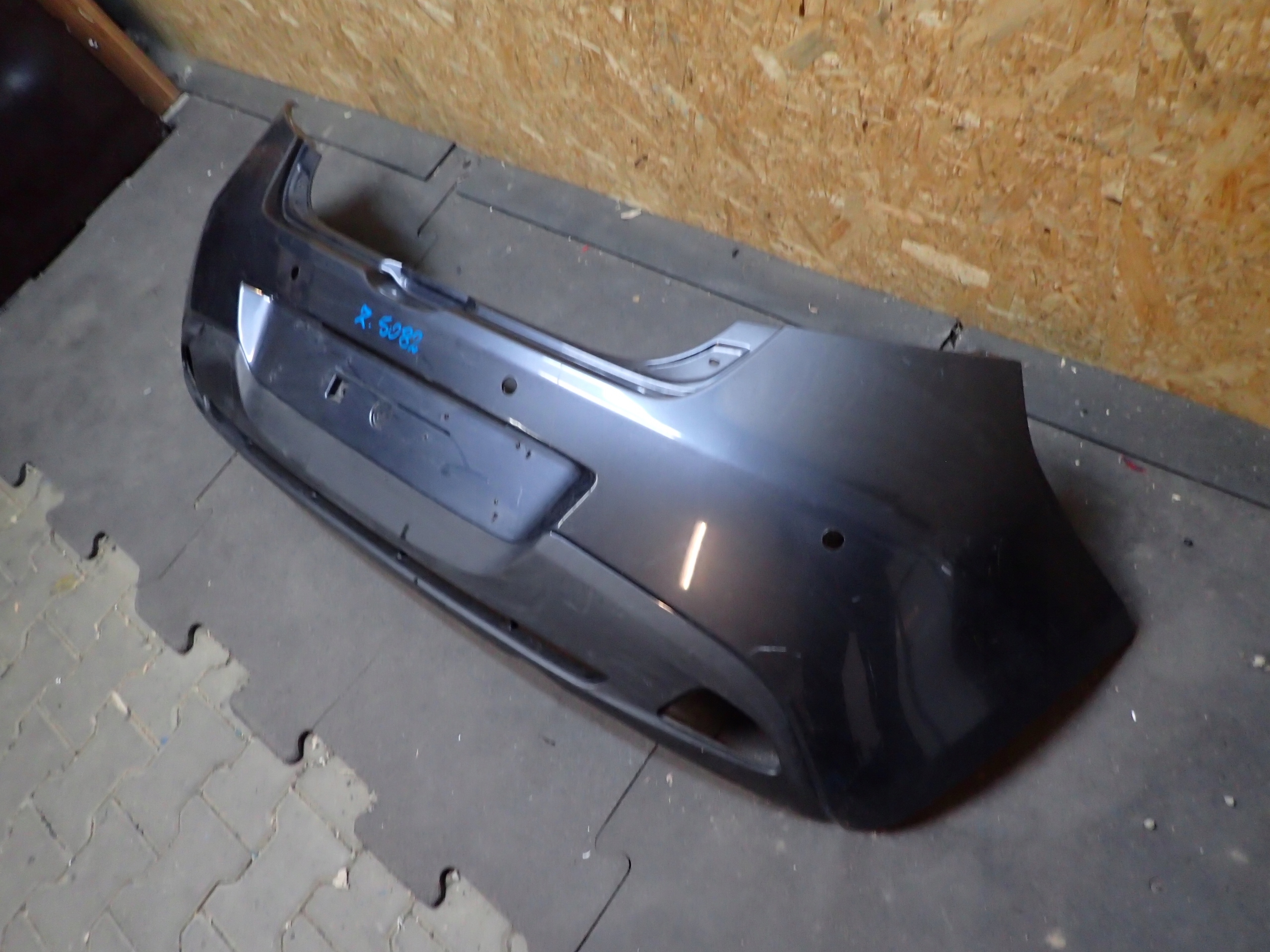 Stoßstange heck MAZDA II 2 07-14