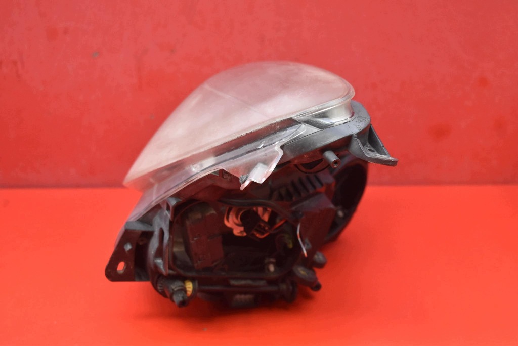 REFLEKTOR left light front EU 13186381 OPEL CORSA D 06-11