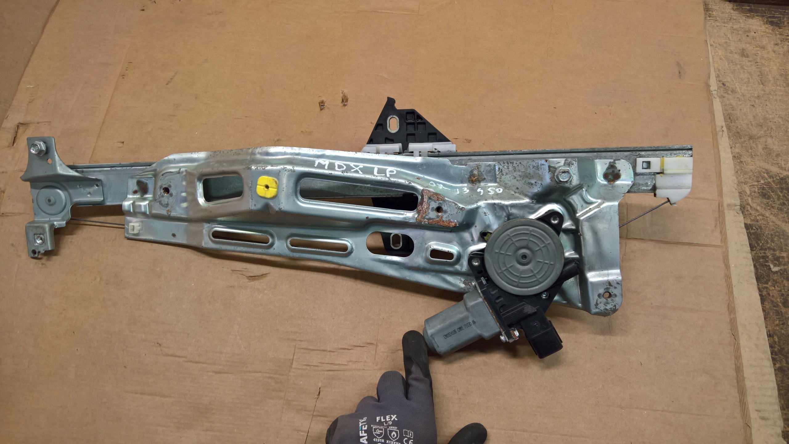 Podnosnik скло лівий передній перед Acura MDX II 09