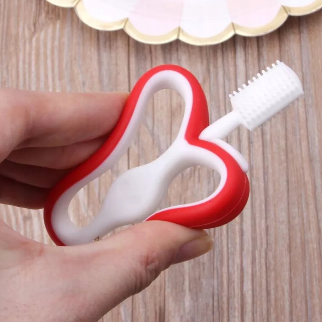 RÁGÓKA EDZŐ FOGKEFE FOGZÁS ALMA Szín piros