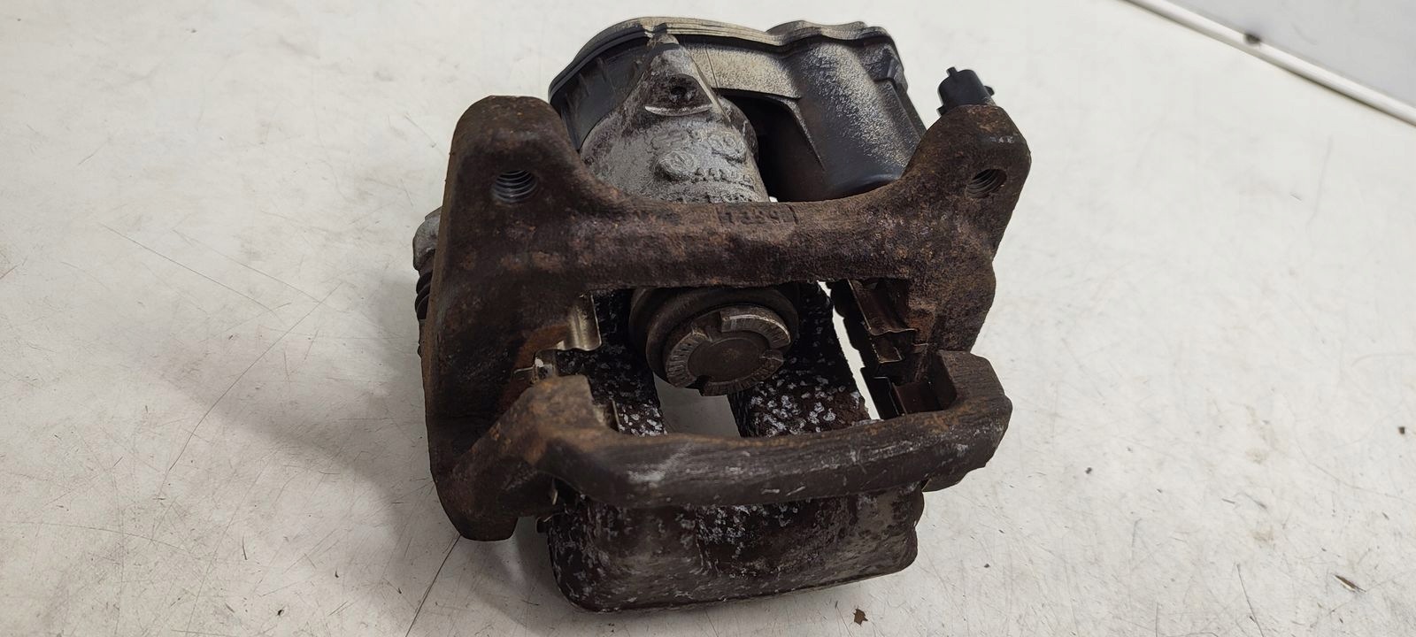 caliper rear part rear left Opel Astra K LIFT 1,5 CDTI