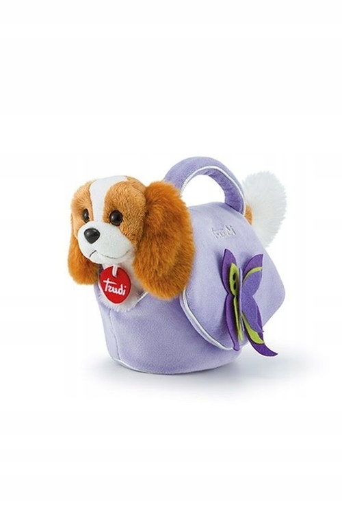 

Trudi Piesek w liliowej torebce z motylkami