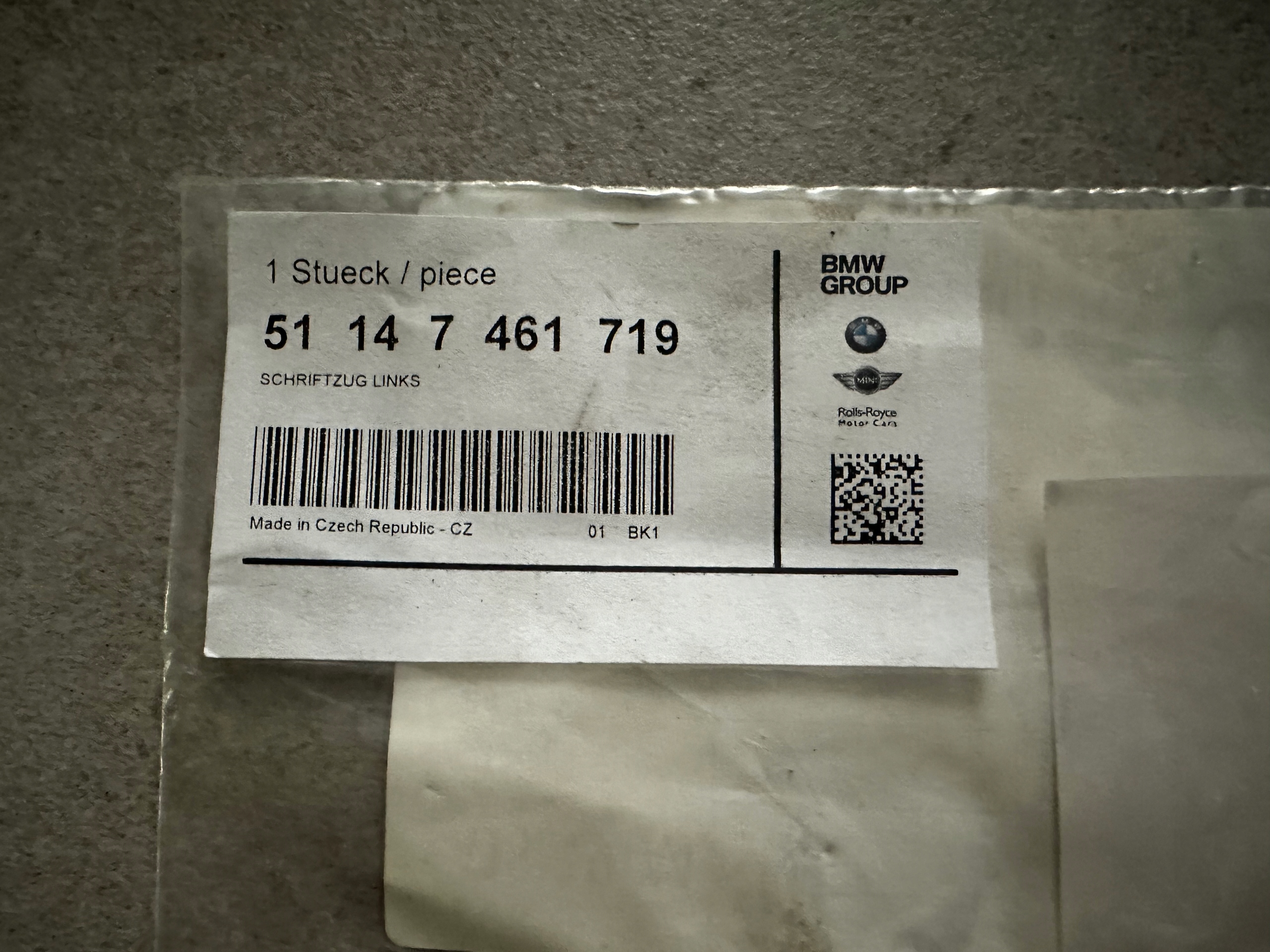 ZNACZEK EMBLEMAT NAPIS BŁOTNIKA LEWY EDRIVE 7461719 BMW F45 Marka BMW