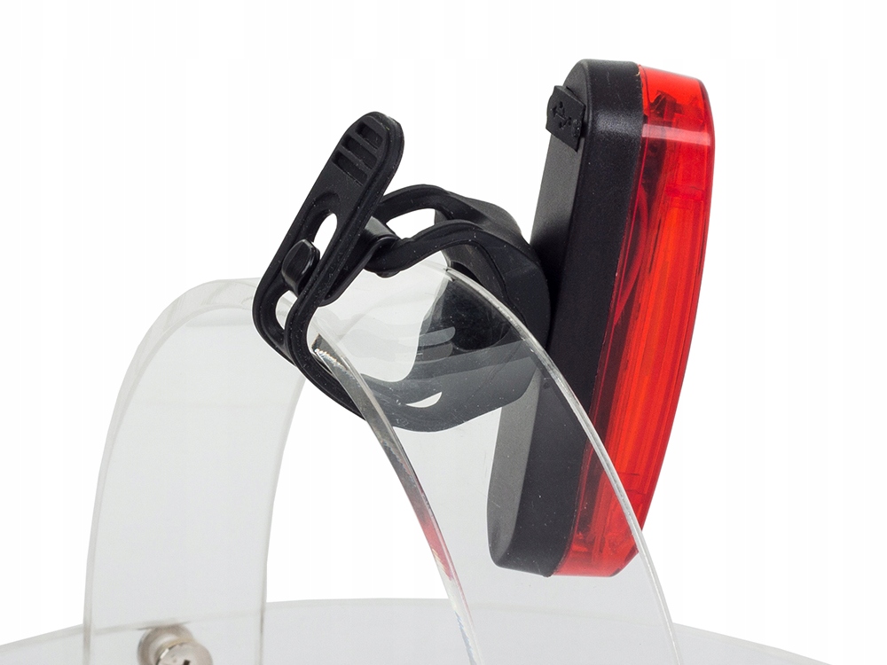 LAMPKA ROWEROWA TYLNA TYŁ ŁADOWANA USB LED COB CZERWONA AKUMULATOROWA Kolor dominujący pomarańcze i czerwienie