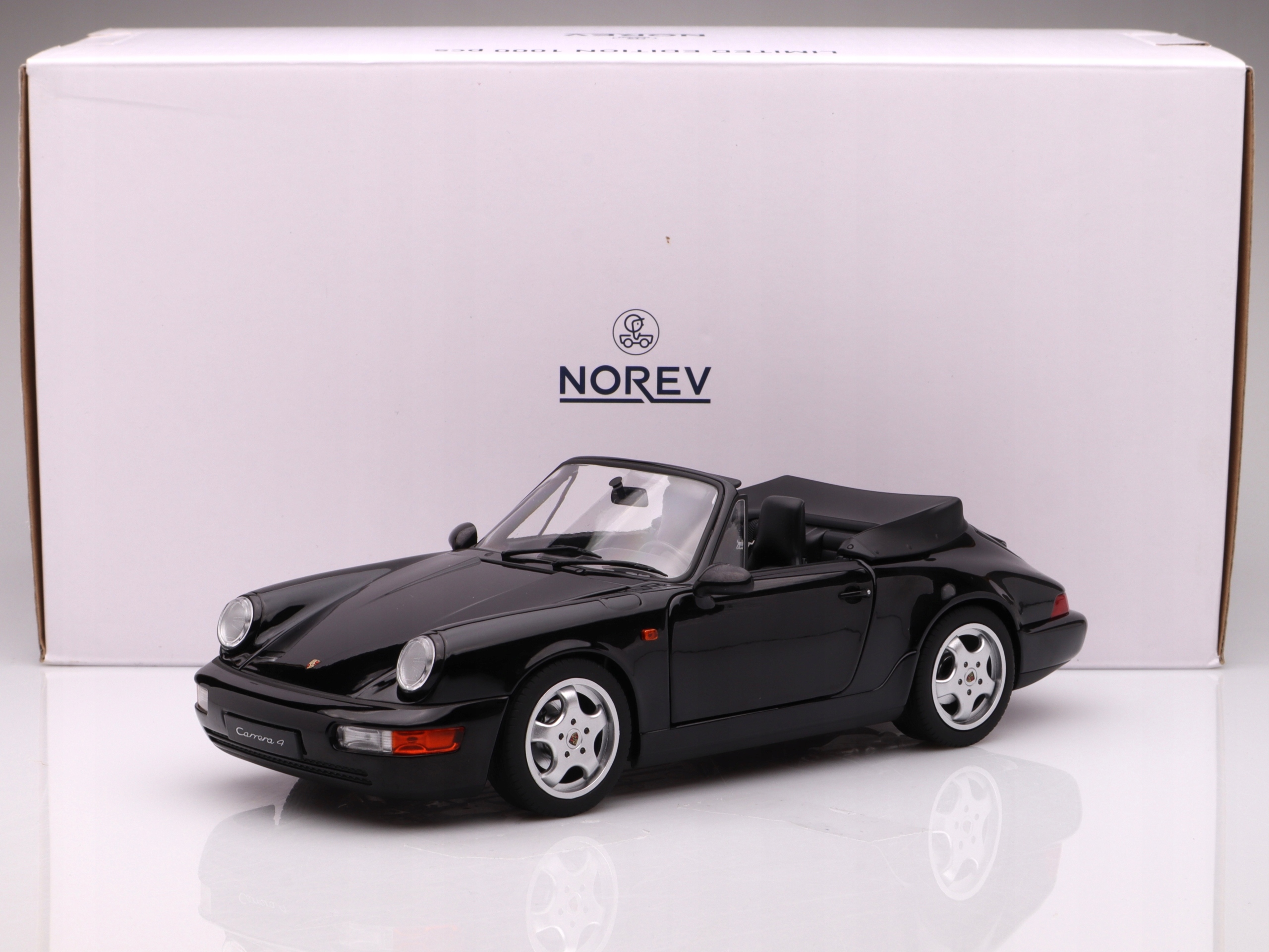 Porsche 911 (964) Carrera 4 Cabrio 1990, blackmetallic Norev 1:18