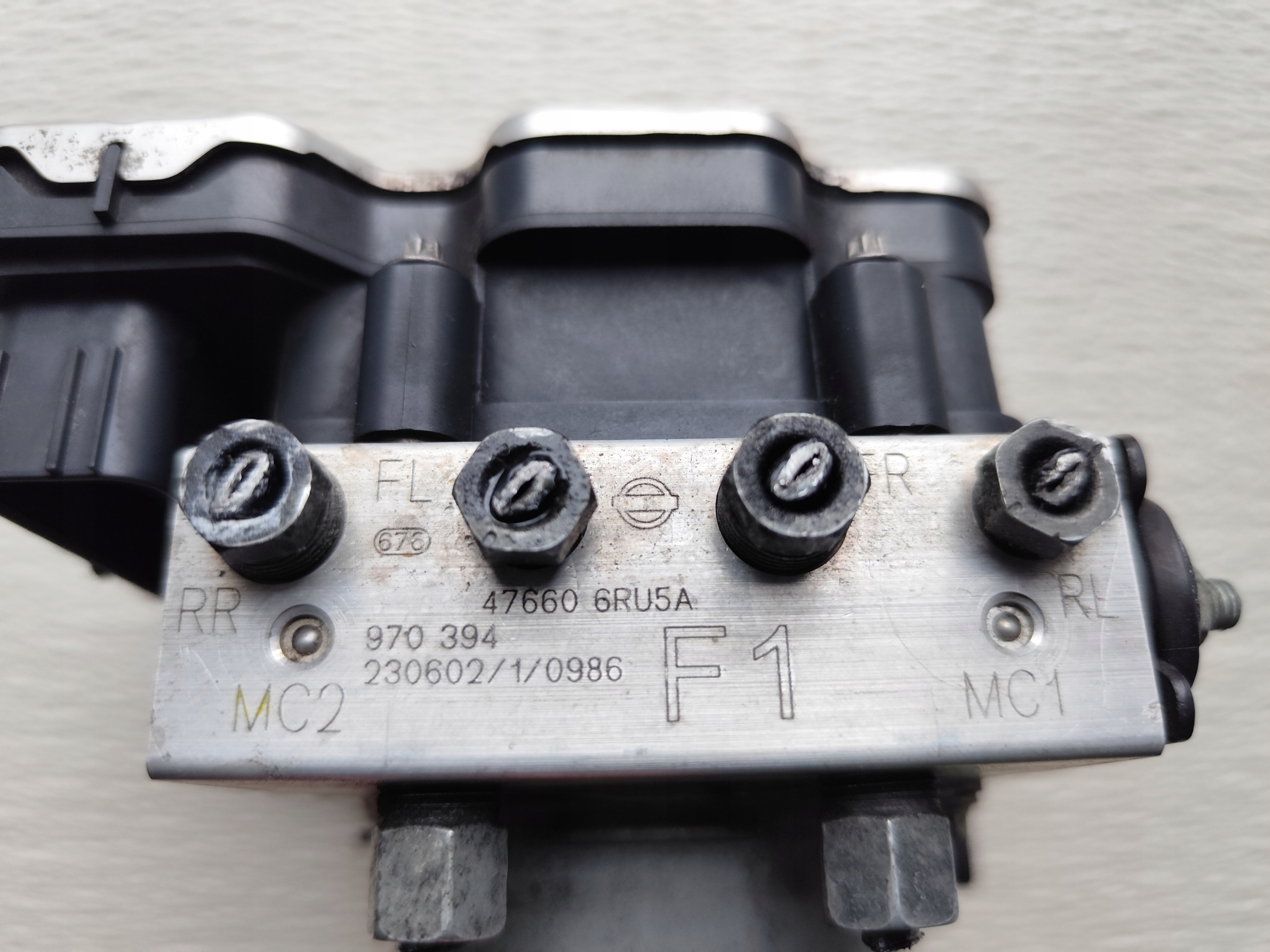 NISSAN X-TRAIL T33 pump ABS control unit 476606RU5A