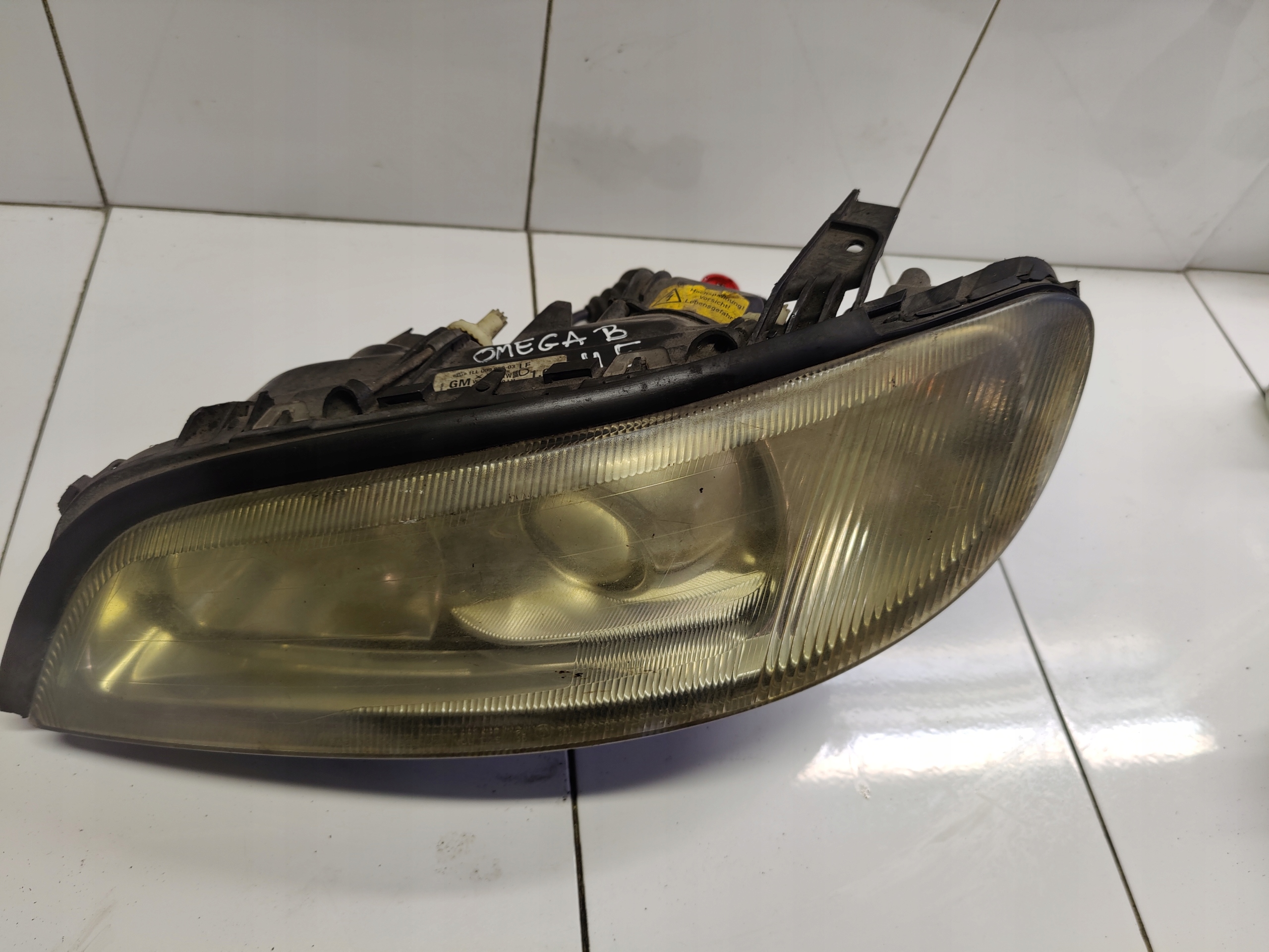 OPEL OMEGA B LIFT light left XENON 24406228 1LL009050