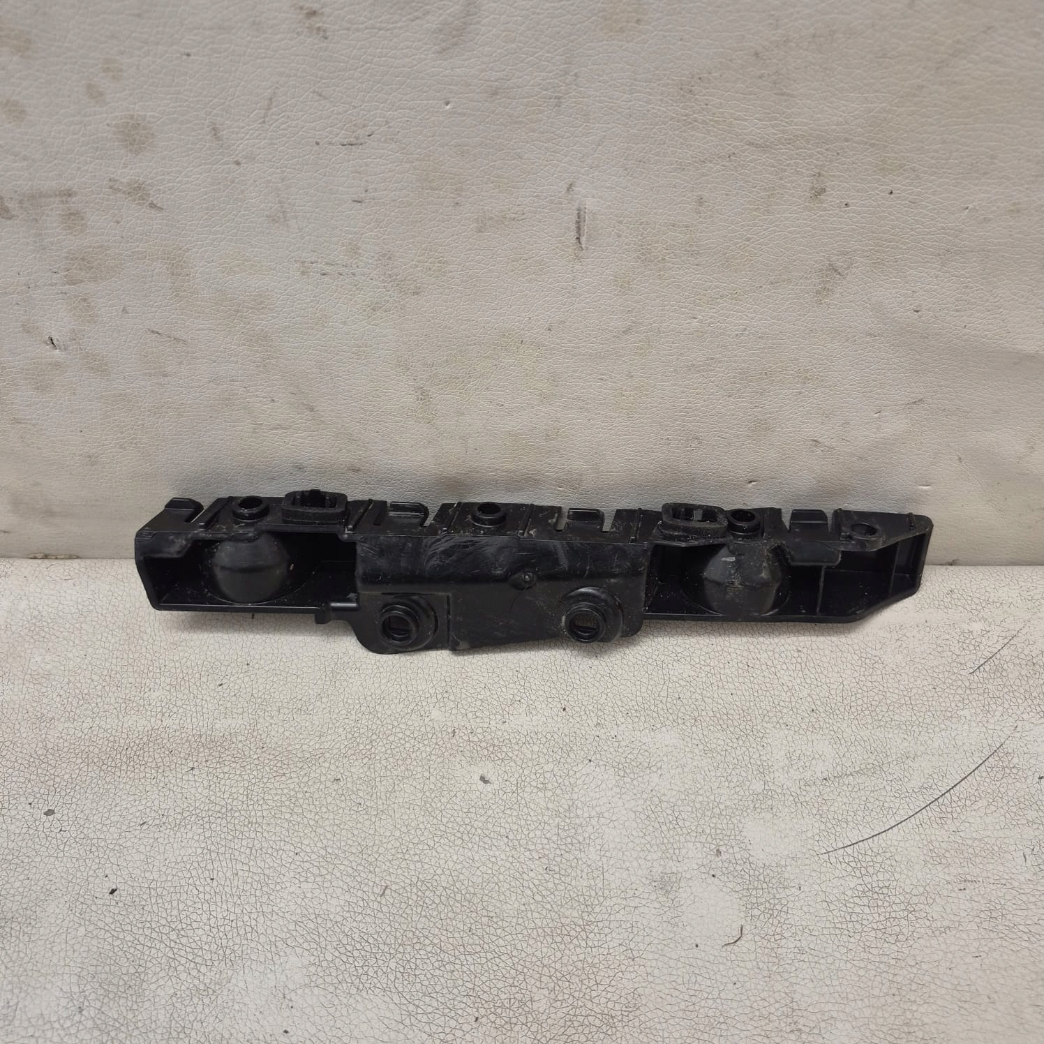 DACIA SANDERO III 3 20-> bracket holder support left rear part