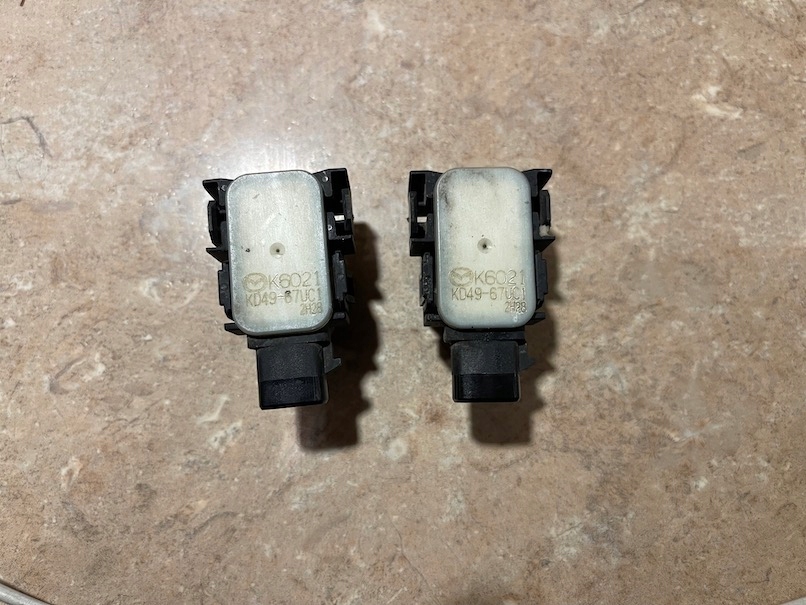 MAZDA CX5 CX3 CZUJNIK COFANIA PARKTRONIK PDC ORYGI Numer katalogowy producenta kd4967uc1