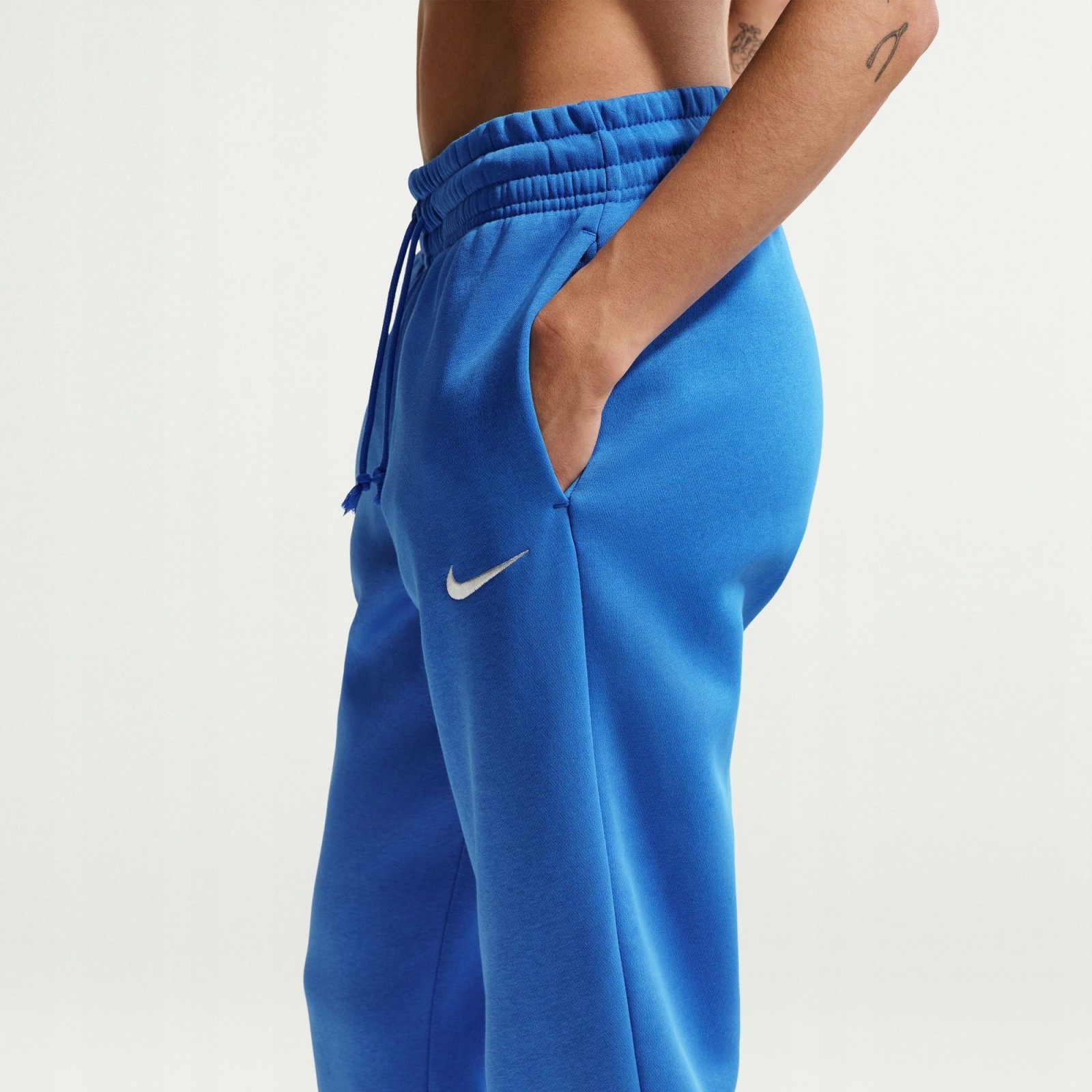 Dámské tepláky Nike W Spw Phoenix Fl Mid-Rise Sweatpant