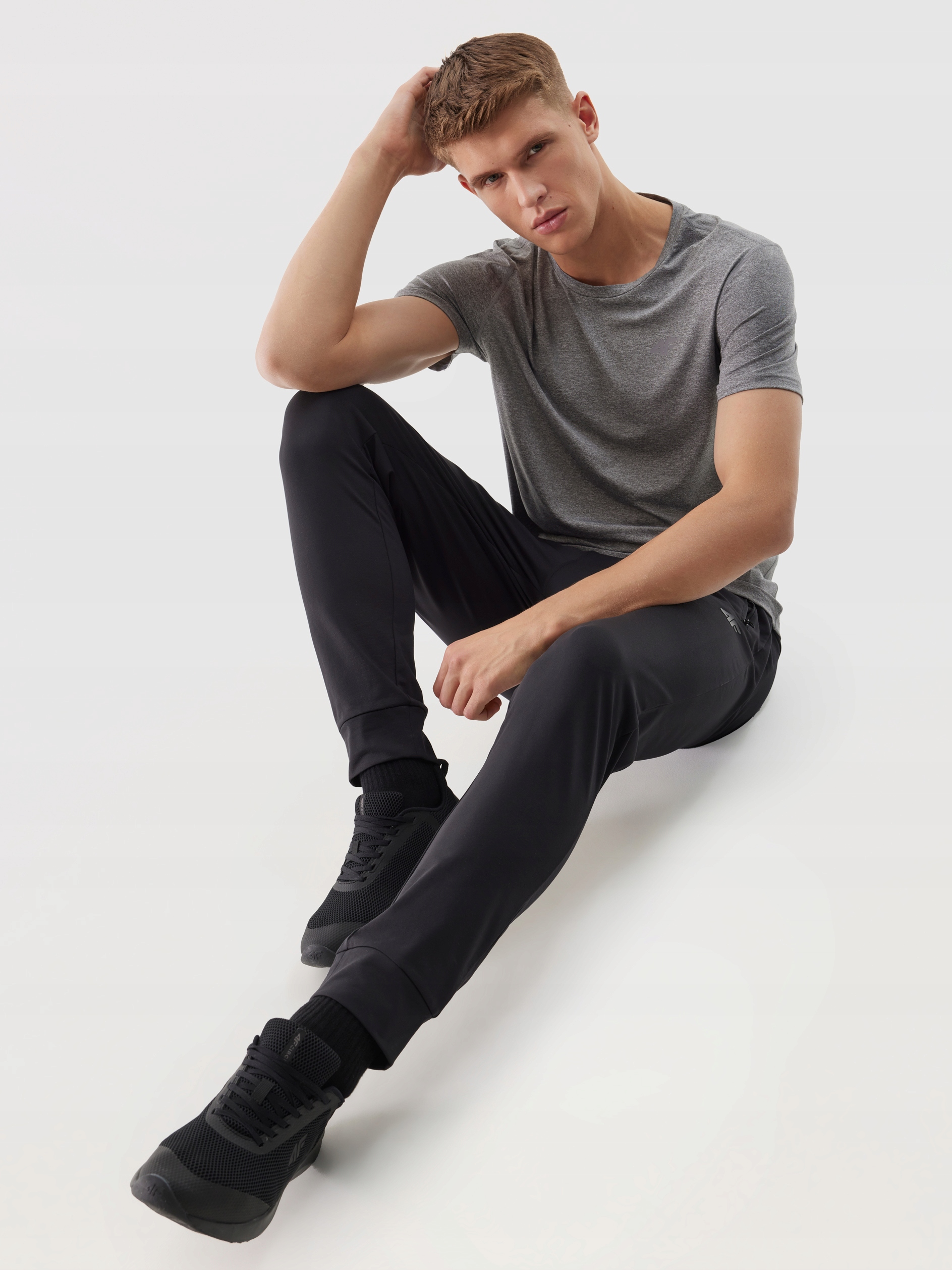 SPODNIE 4F MĘSKIE TRENINGOWE SZYBKOSCHNĄCE - CZARNE r. 3XL Marka 4F