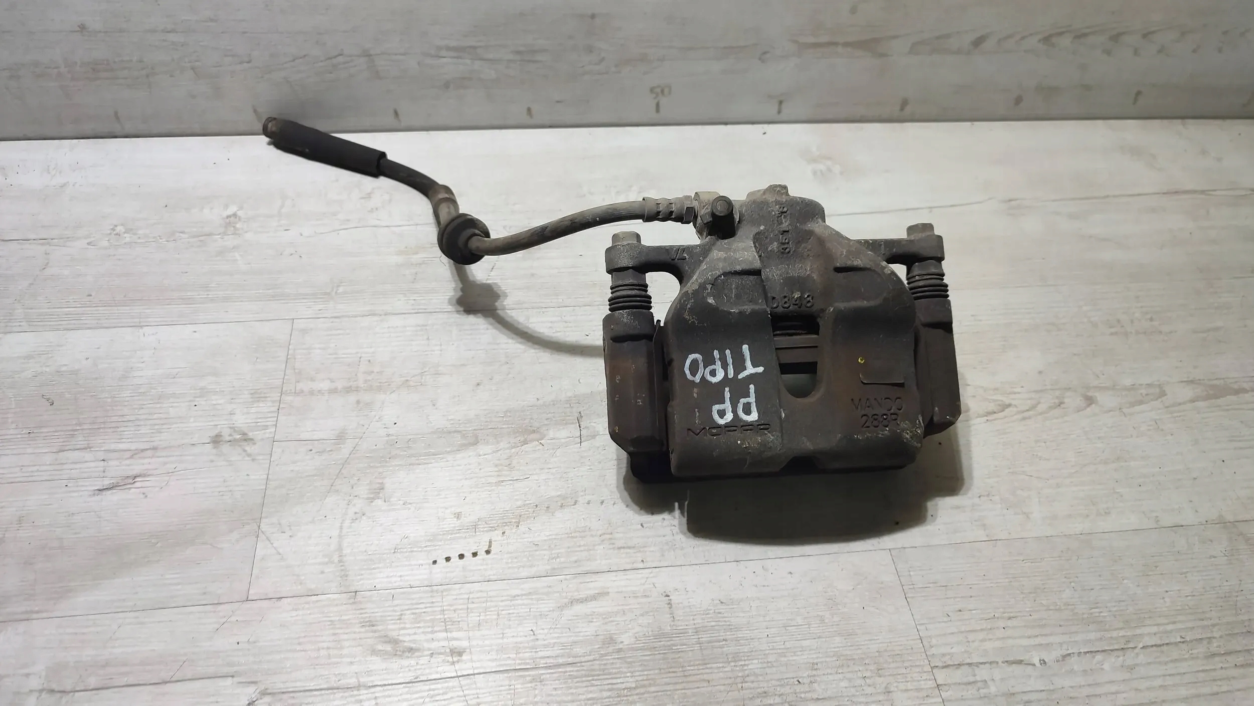 Fiat Tipo II HB 19r. 1.4 front side right caliper