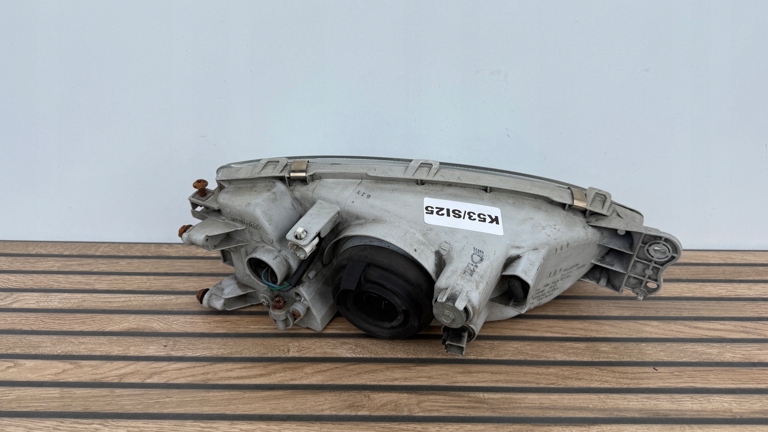MITSUBISHI COLT 96-03 ROK left light front original 100-87148 K53/SI25