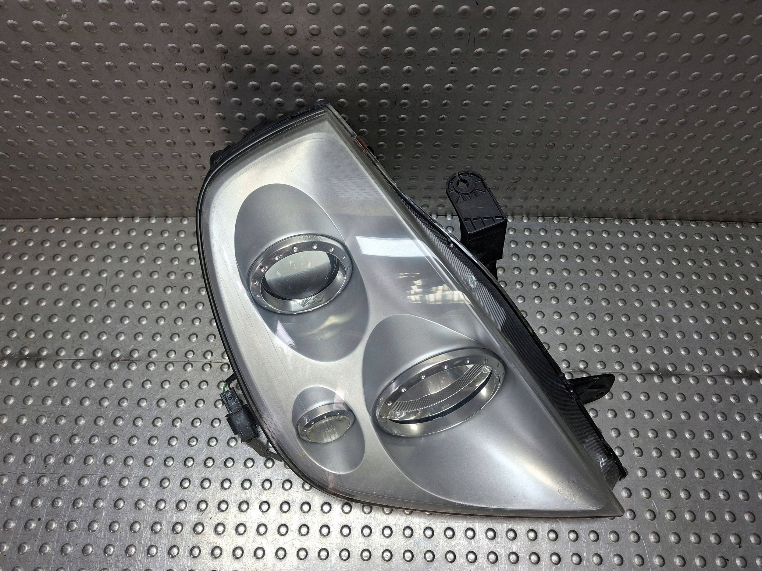 light right REFLEKTOR SSANGYONG REXTON and 01-06 EUROPA 108-0399