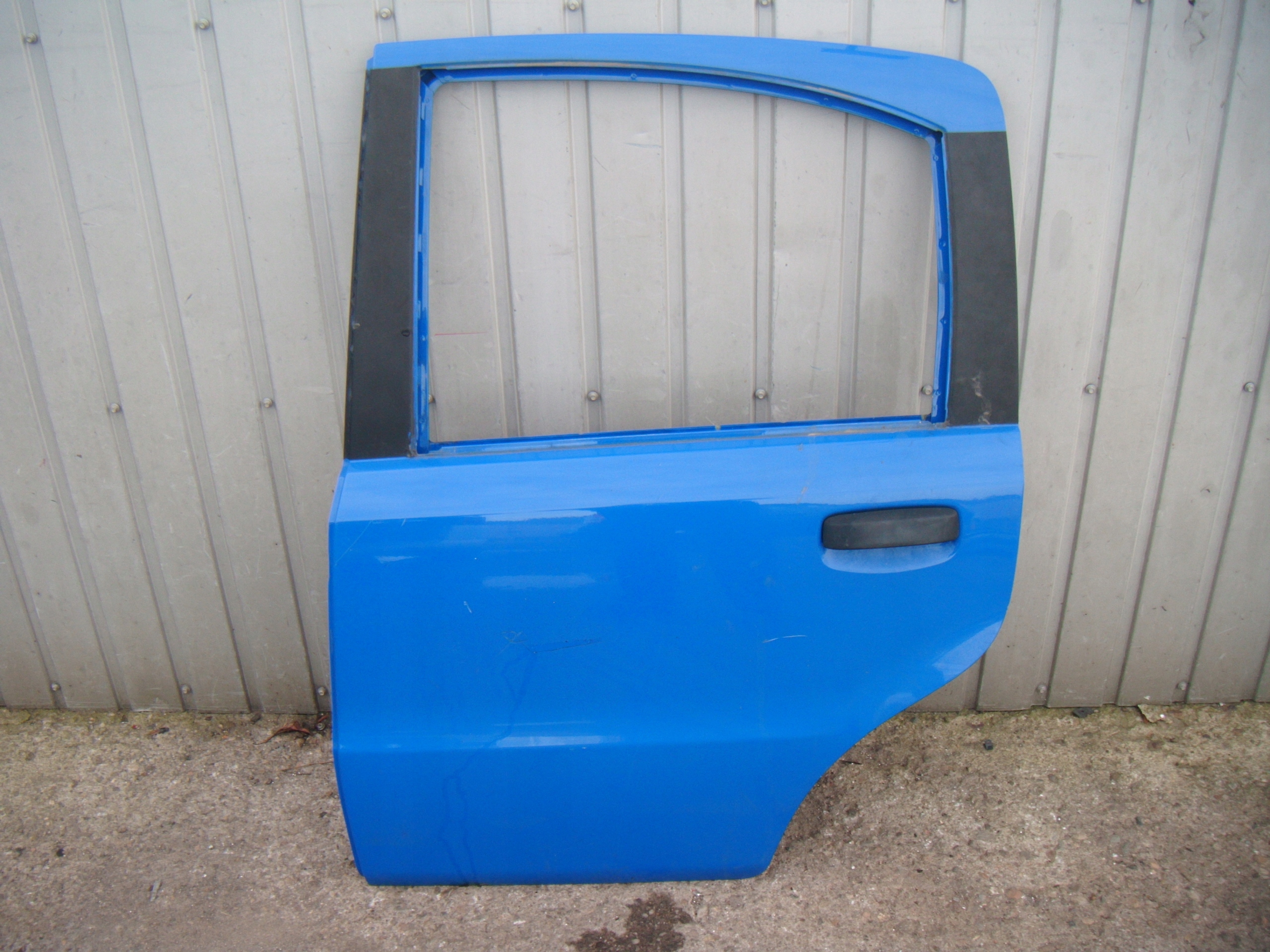 FIAT PANDA 2 II 2003-2012 DRZWI LEWY TYŁ 734/A