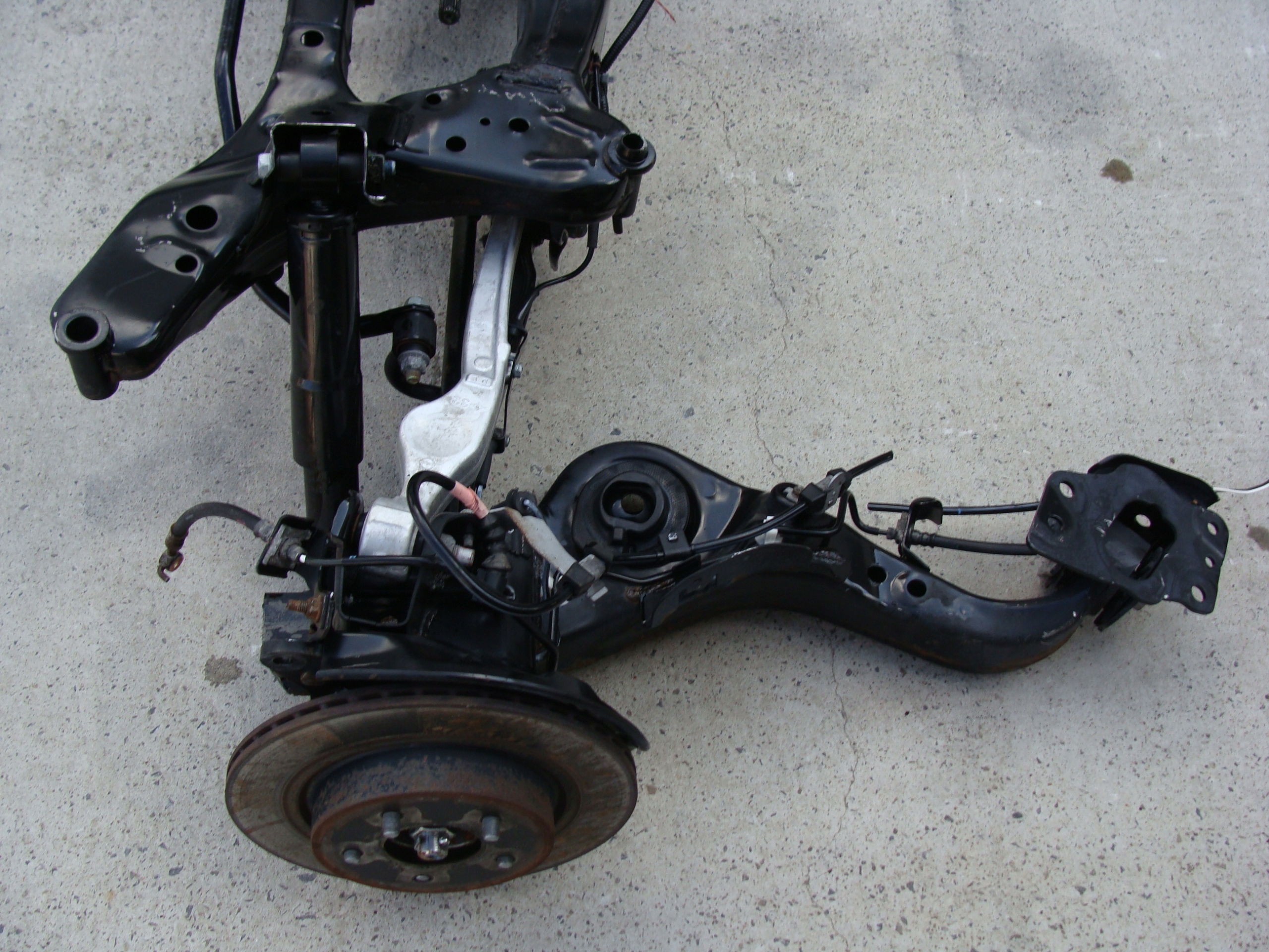 ZAWIESZENIE TYLNE NISSAN X-TRAIL T32 4WD 4X4 AWD 2.0 DCI Producent części Nissan OE